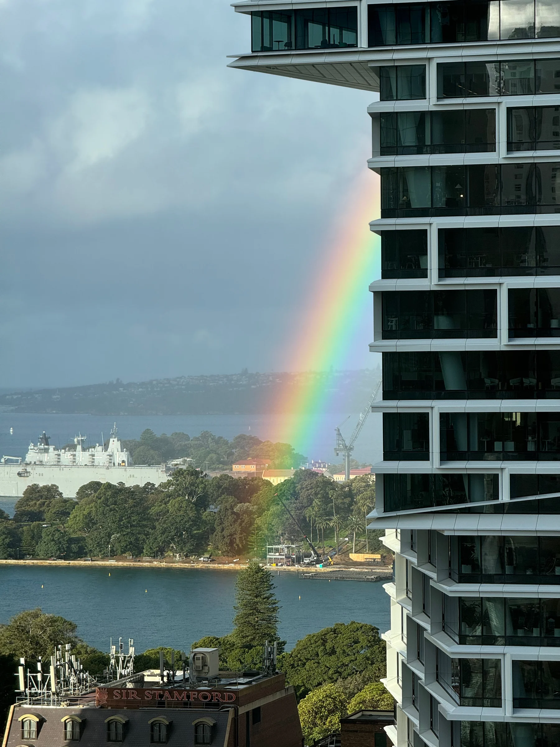 A rainbow beyond the window.