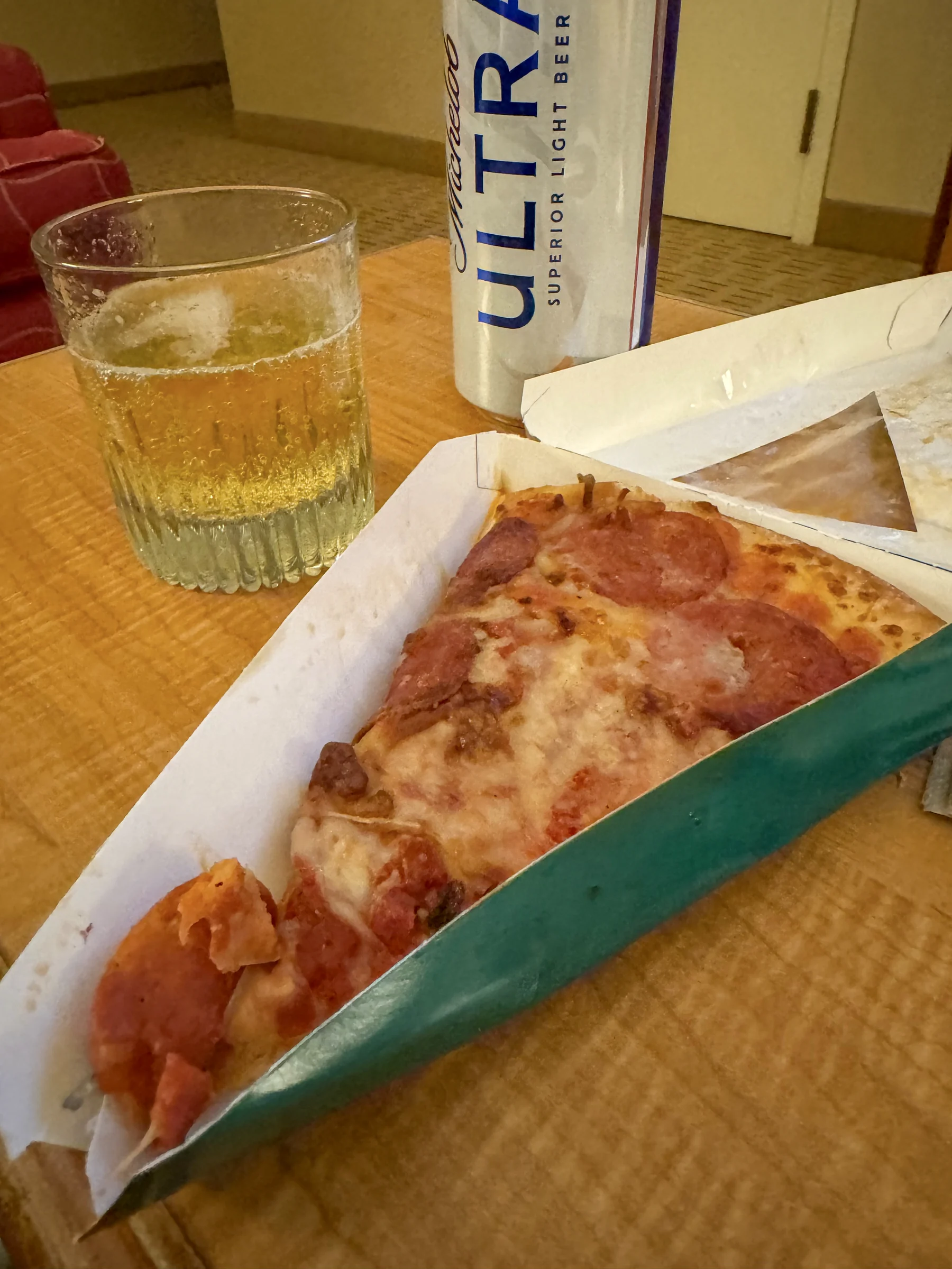 Takeaway pizza in the room.