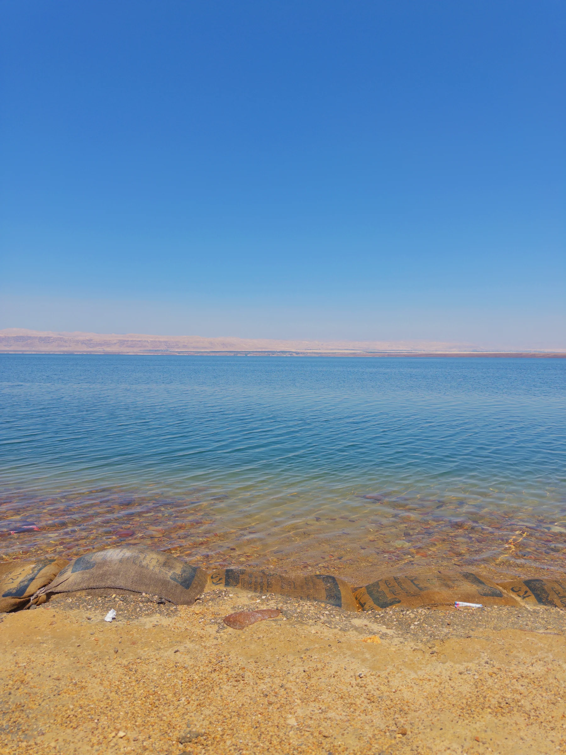 The bottom visible in the Dead Sea’s shallows.