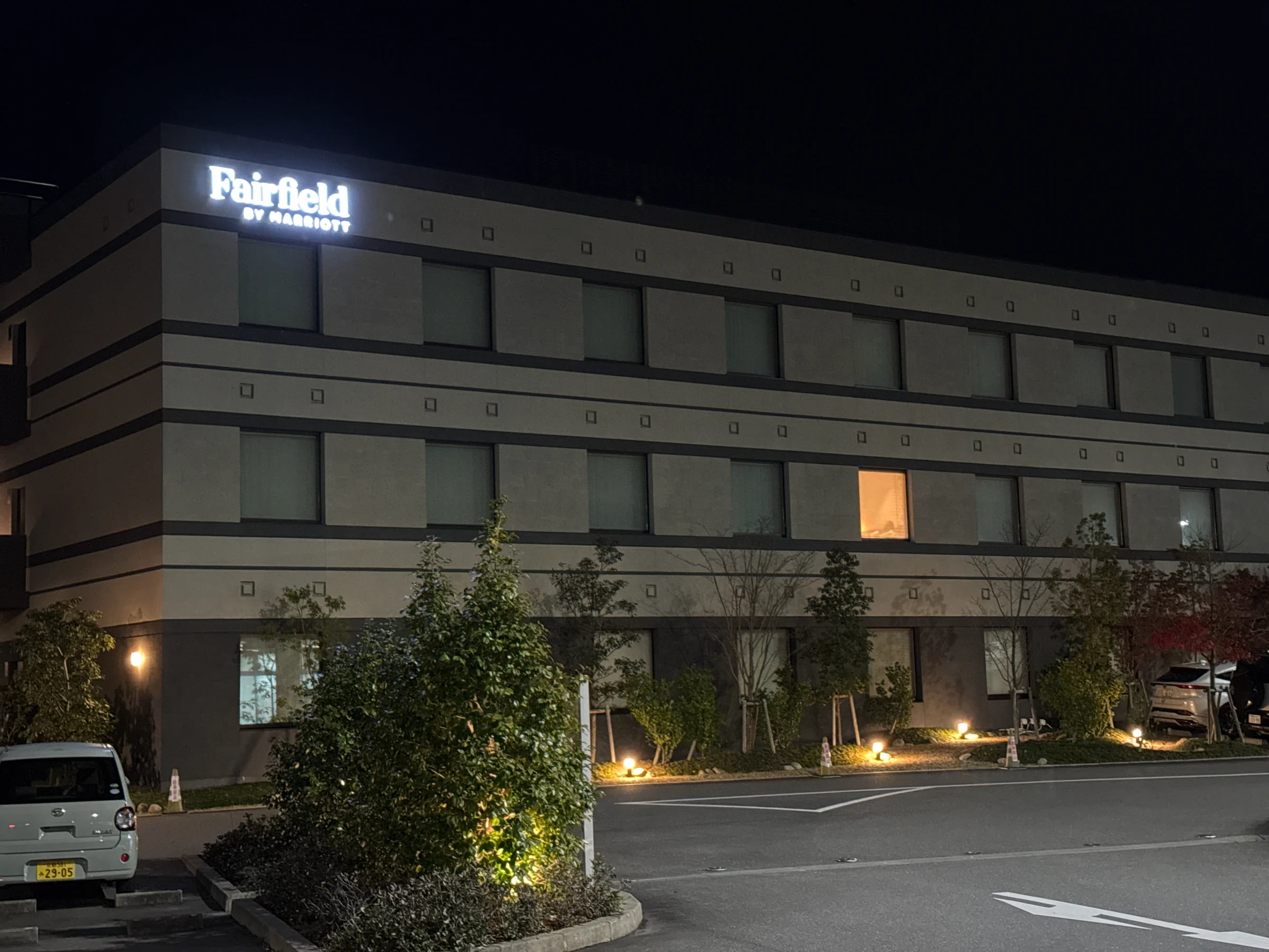 The hotel exterior at night