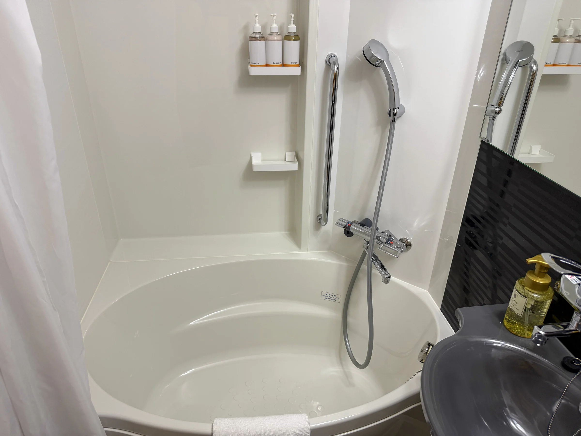 The bathtub and shower.