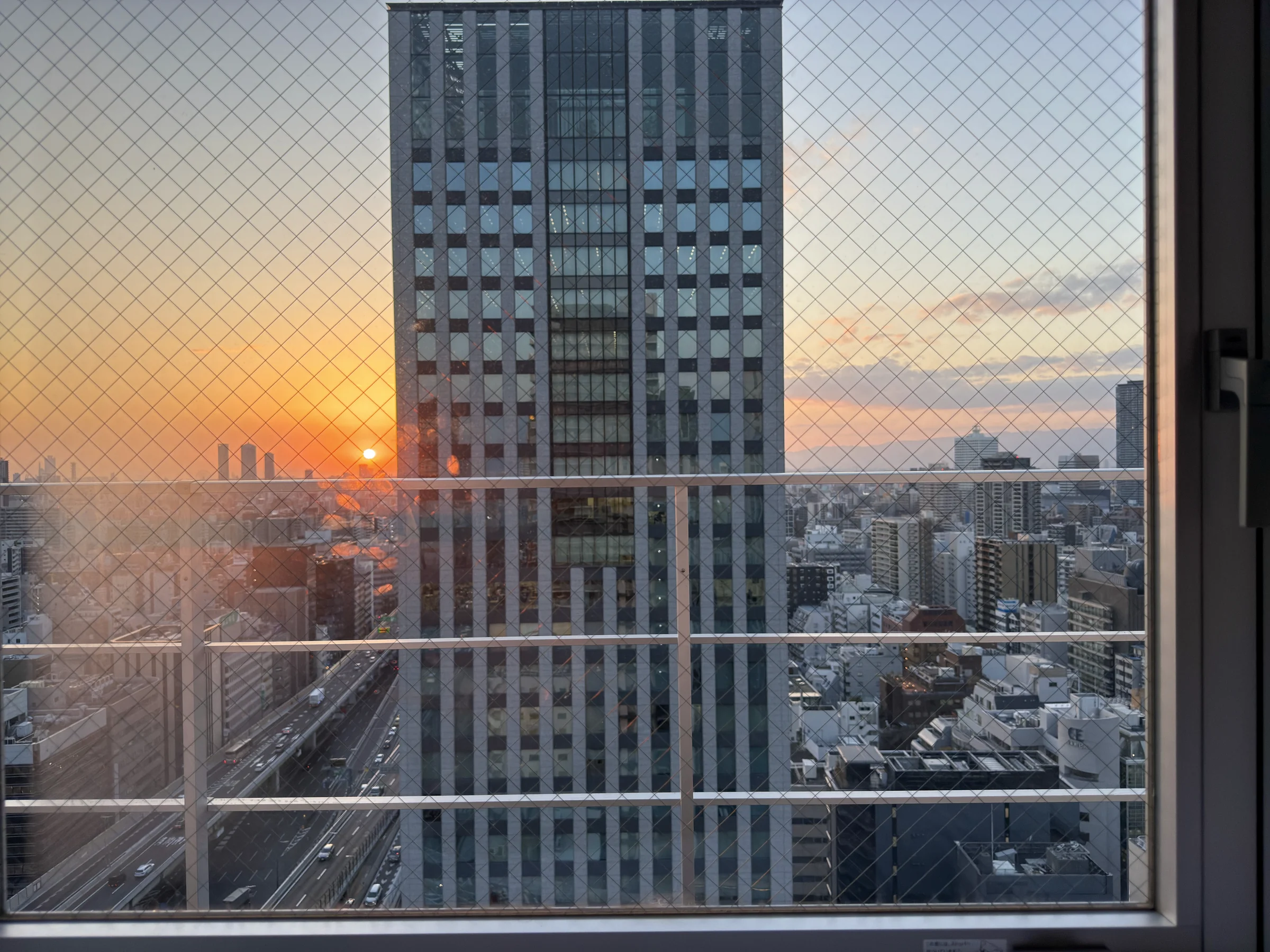 By the window at dusk.