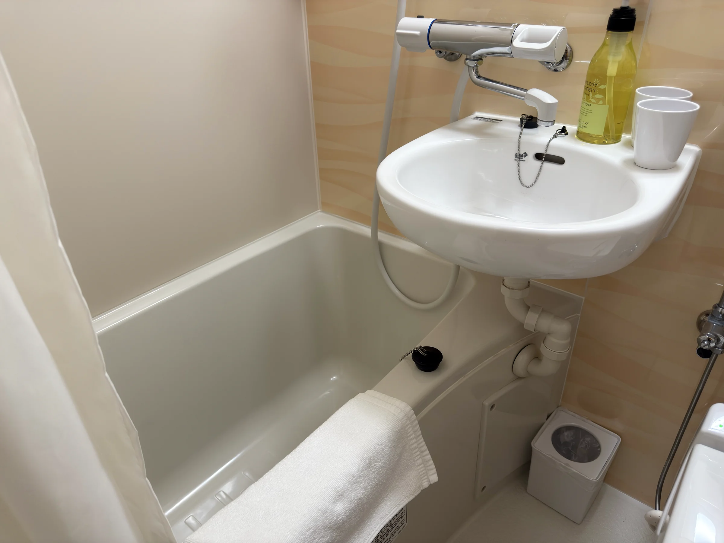 The compact combined bathroom.