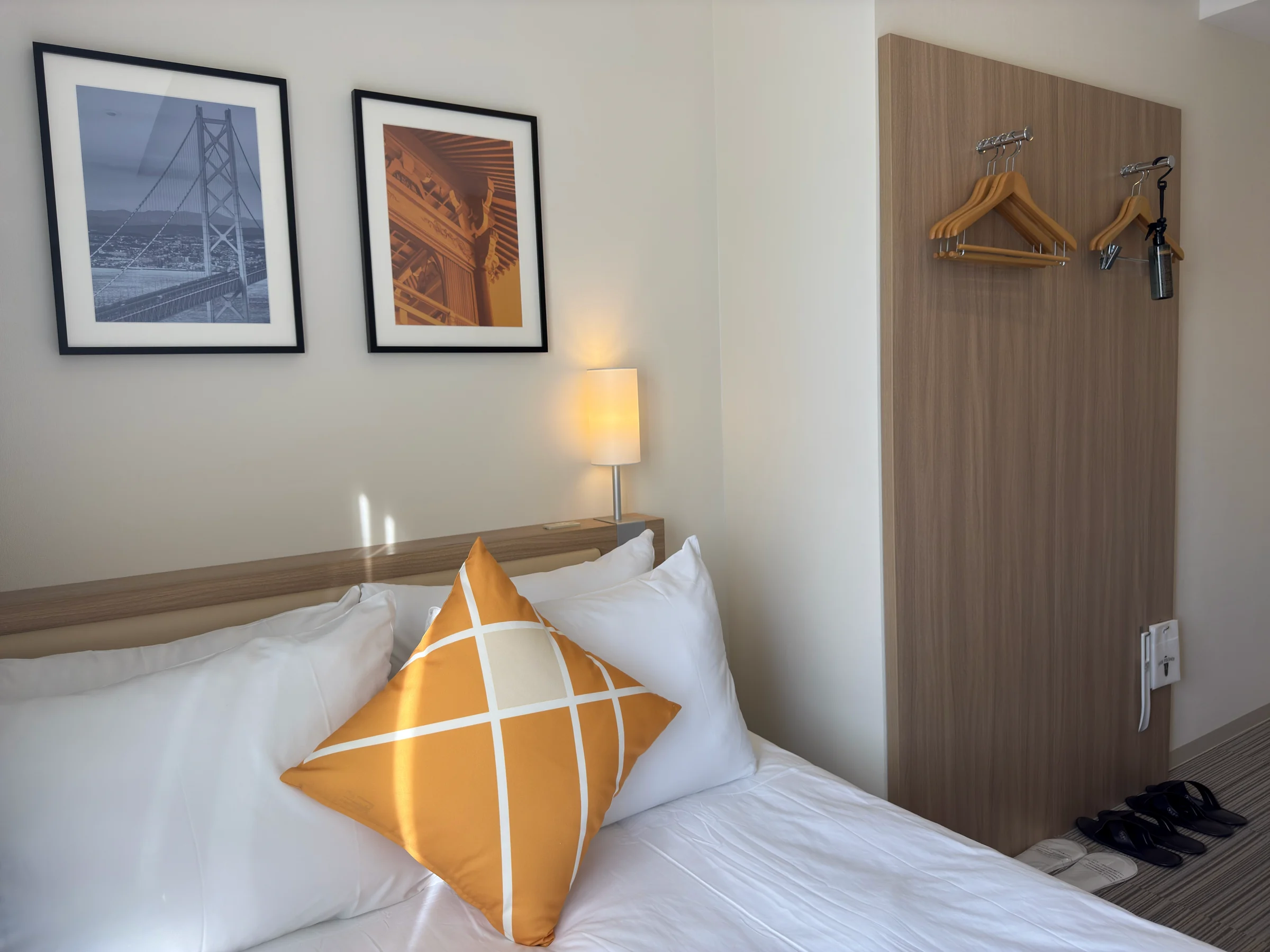 Orange cushions and wall art