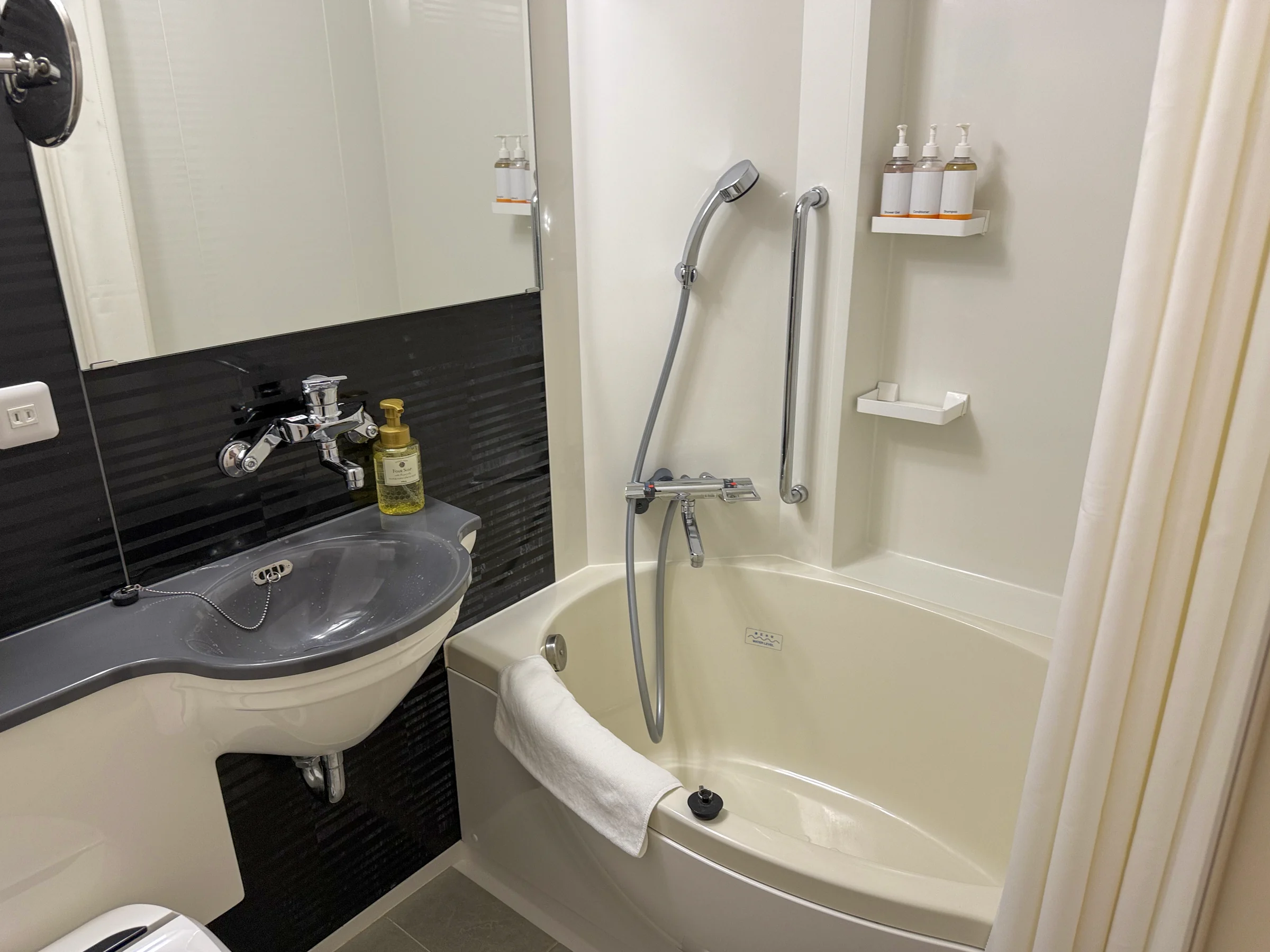 A welcome bathtub after a day of walking.