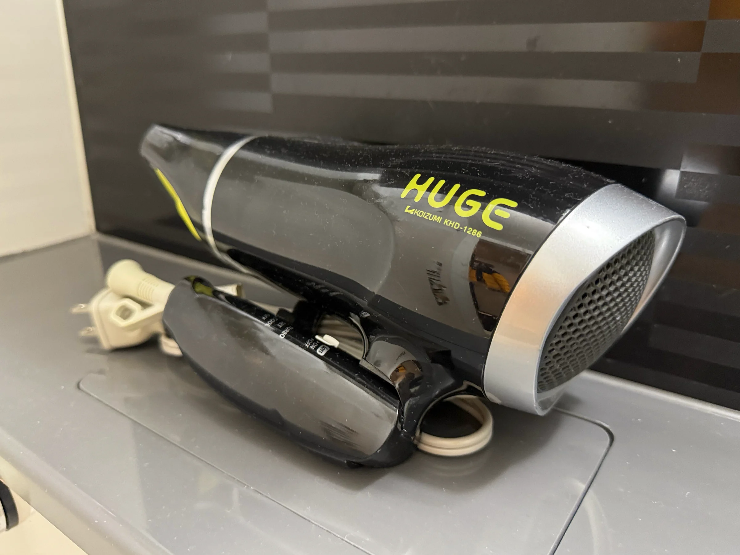 The room’s hair dryer.