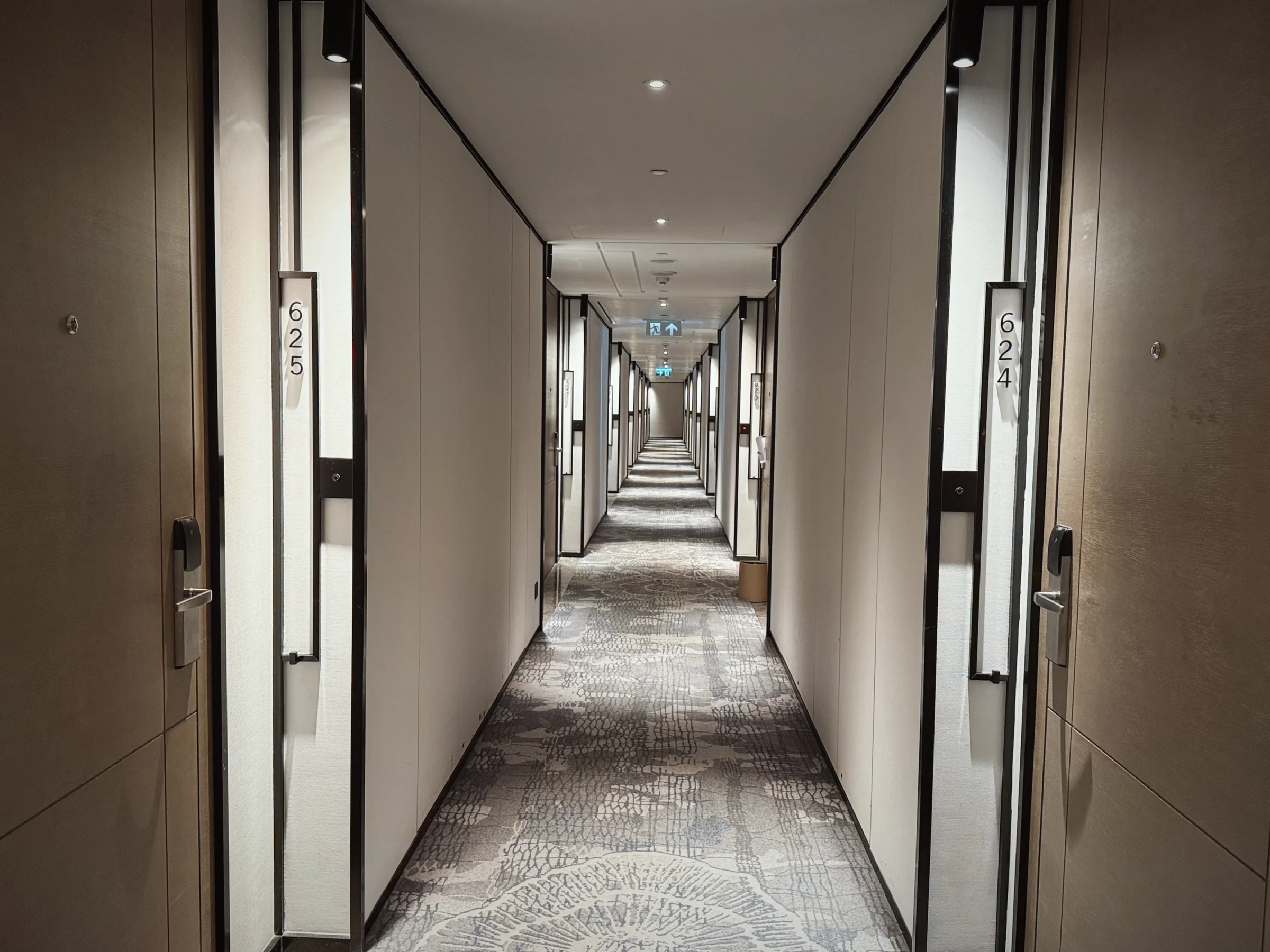 The long sixth-floor corridor towards room 601