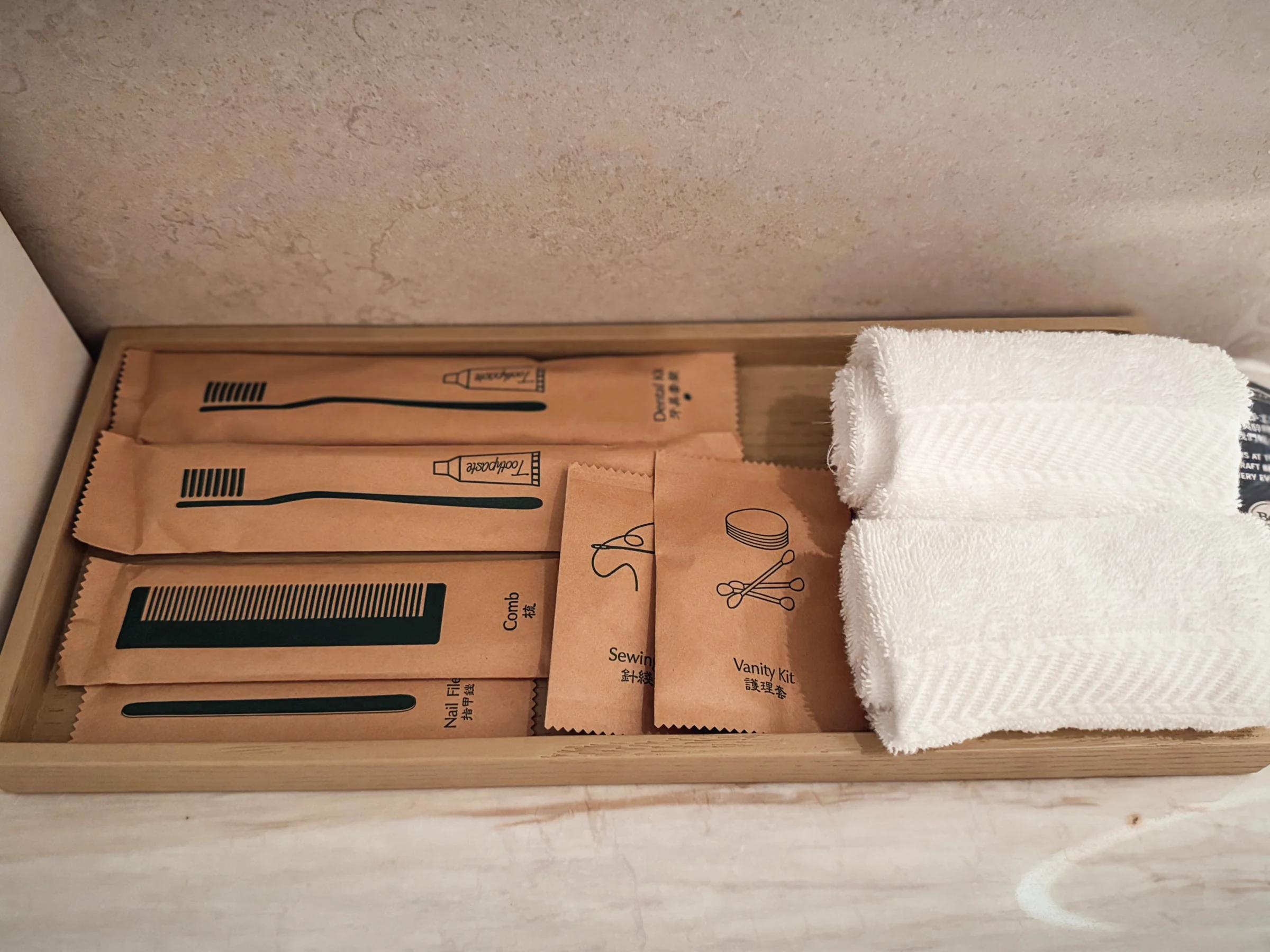 Paper-wrapped amenities and towels