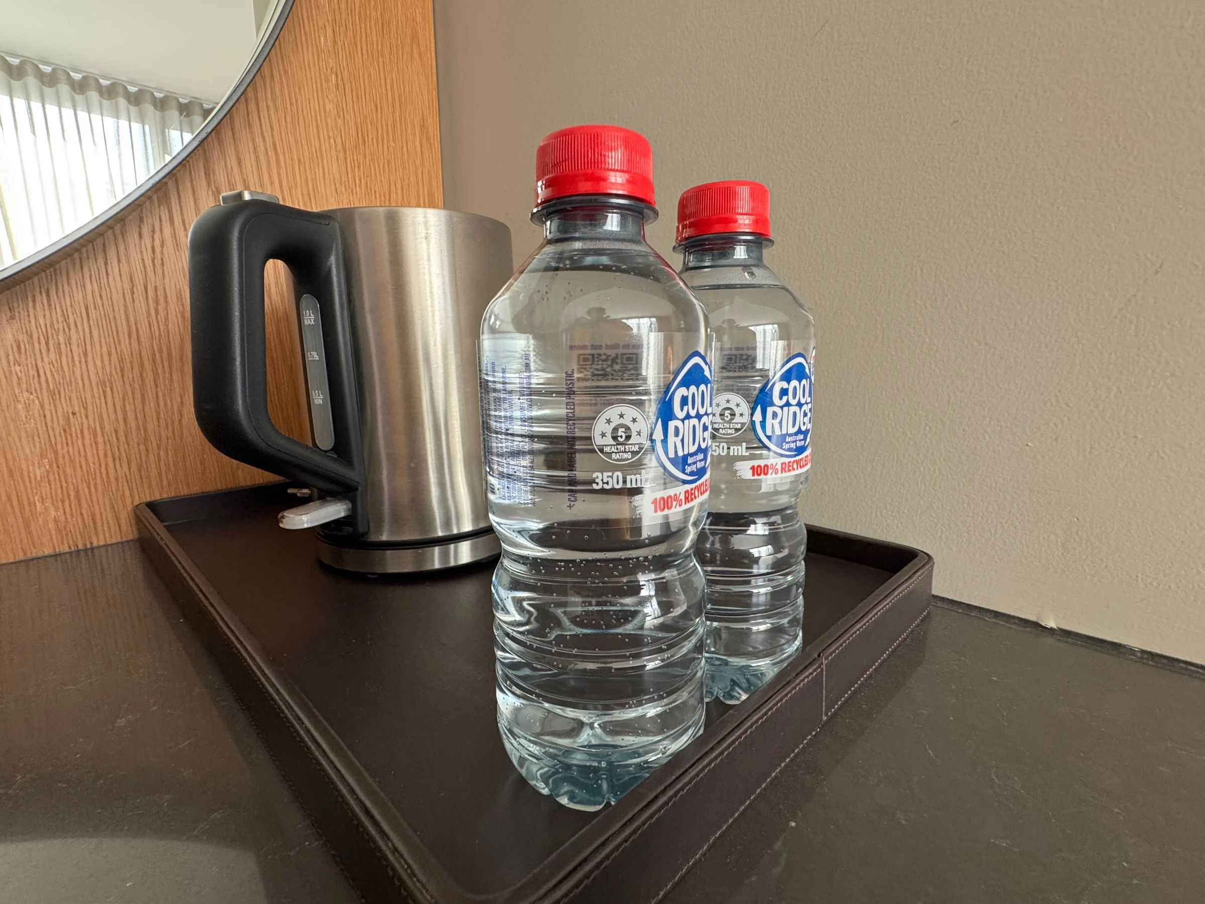 Water and an electric kettle in the room.