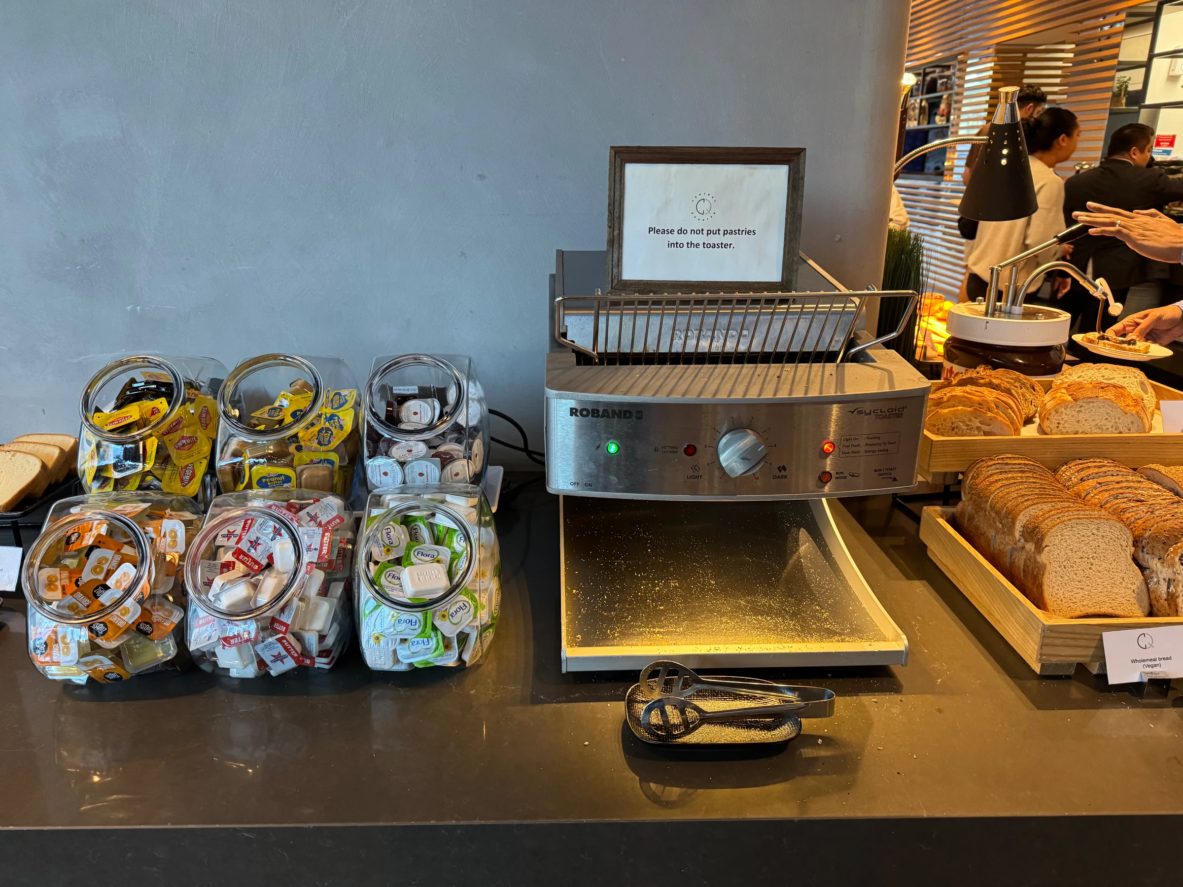Jams and spreads beside the toaster.