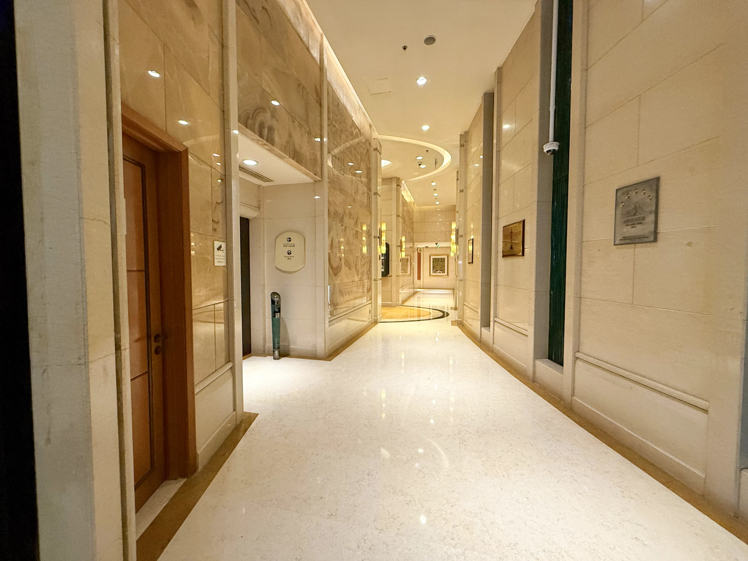 The marble-walled passage to the elevators.