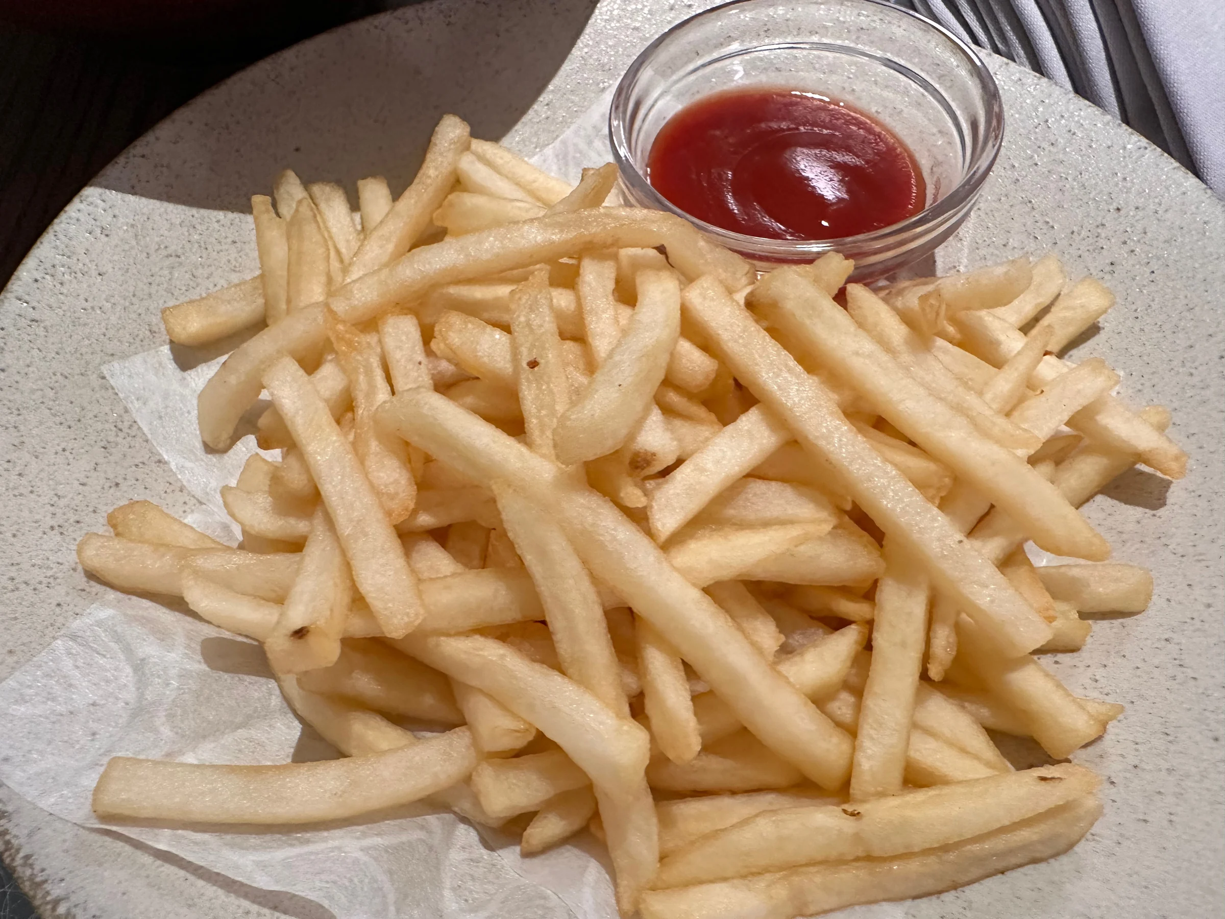 Fries alongside the meal.
