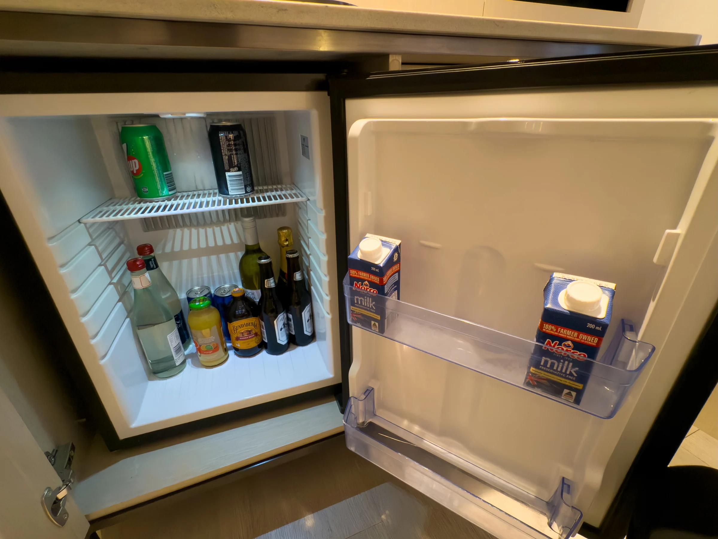 The minibar refrigerator.