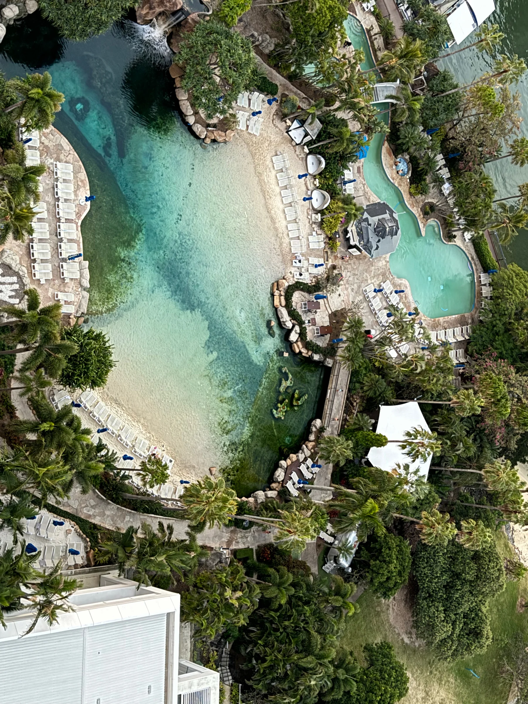 The lagoon pool directly below the balcony.