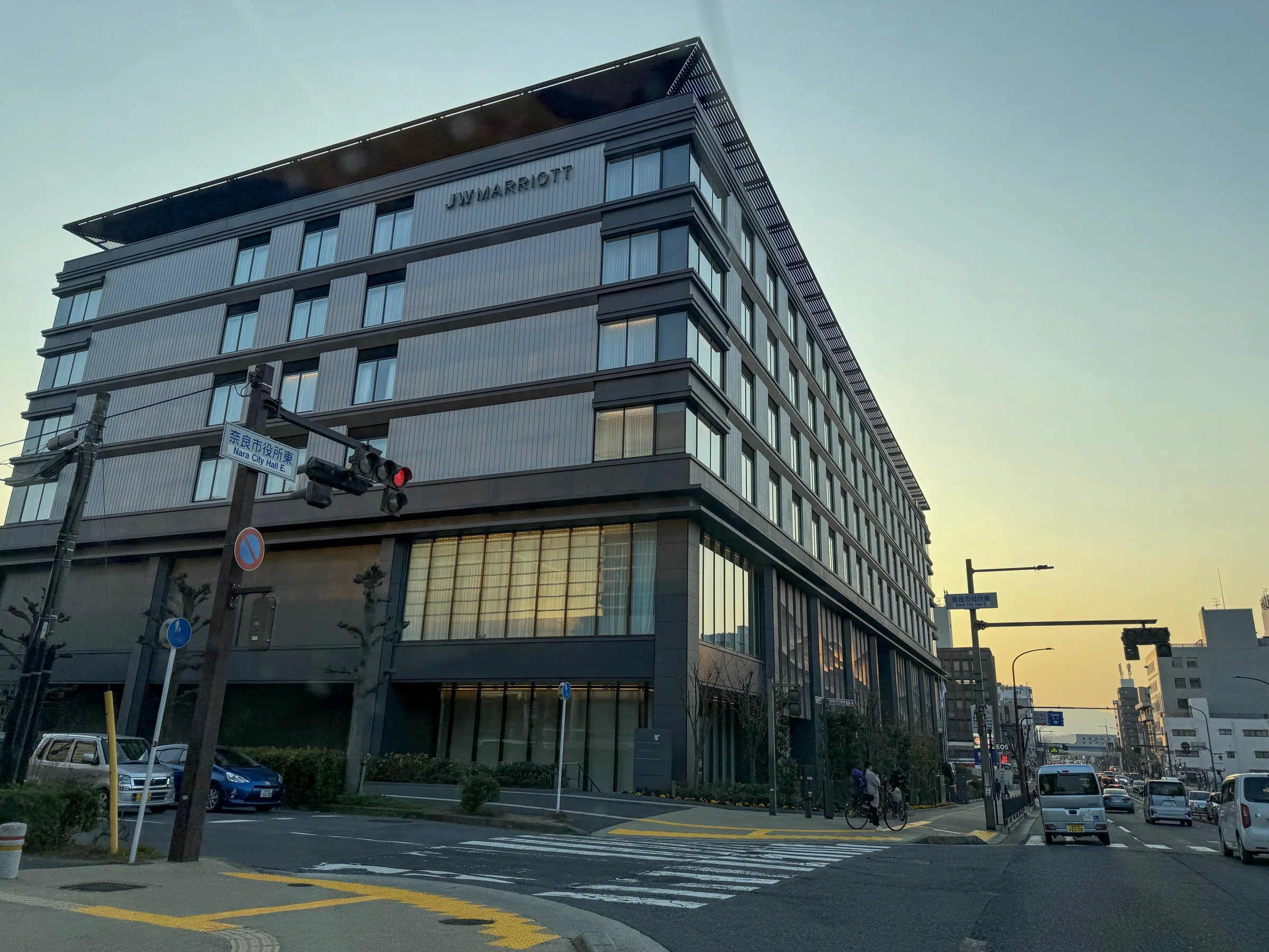 The hotel exterior in the evening.