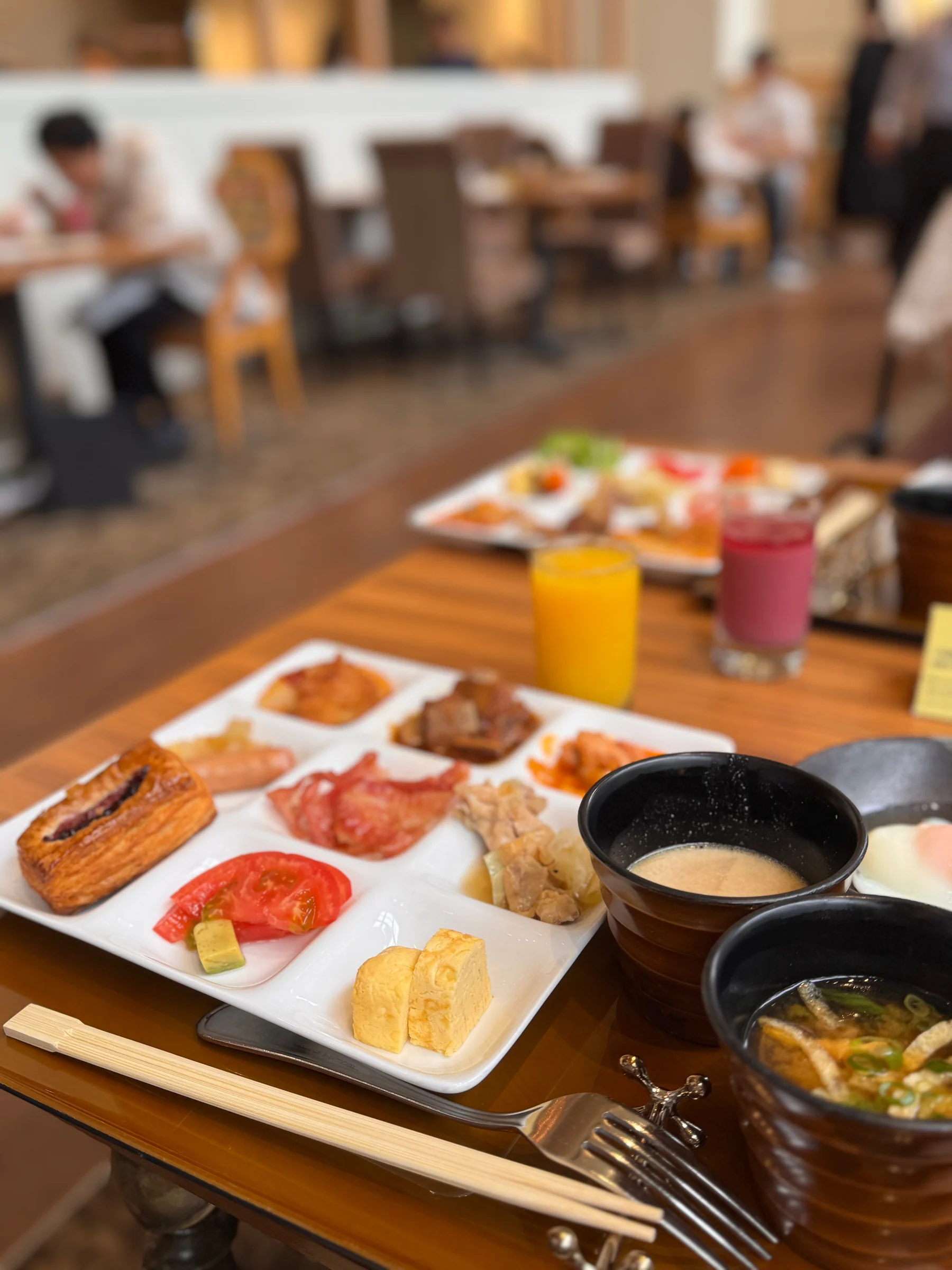 Breakfast at a table by the window.