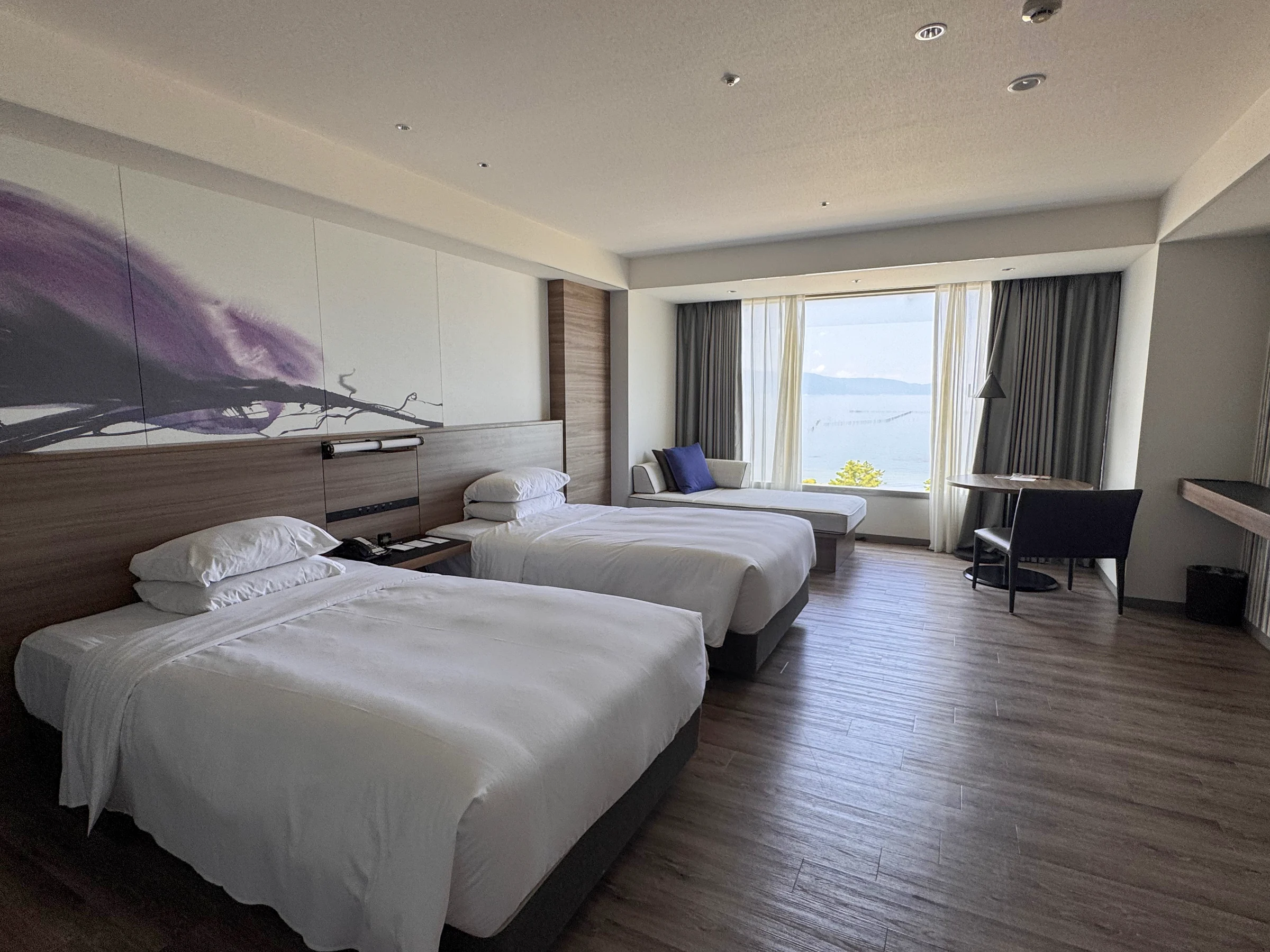 A twin room with Lake Biwa beyond the window