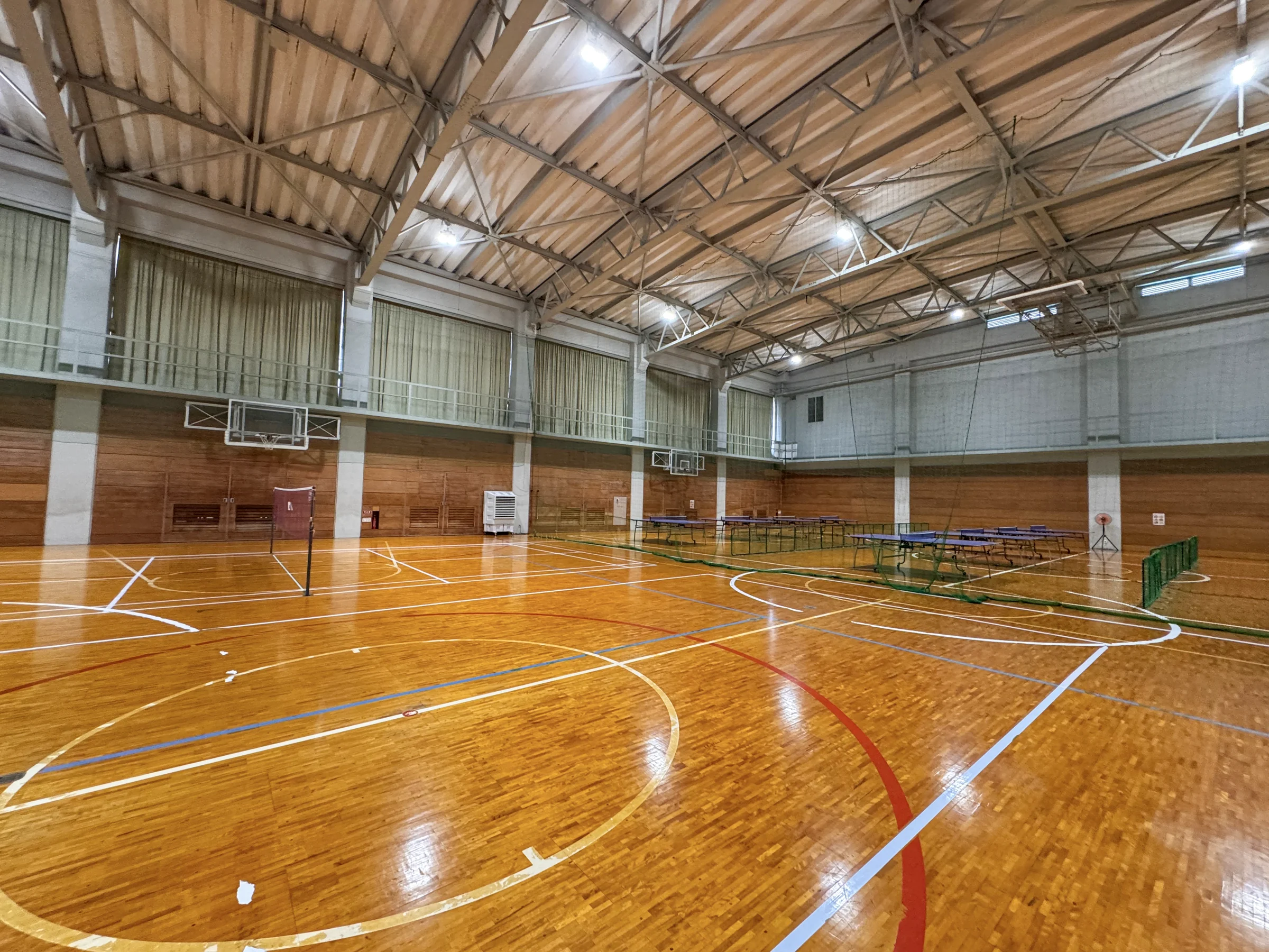 The gymnasium with its wooden court