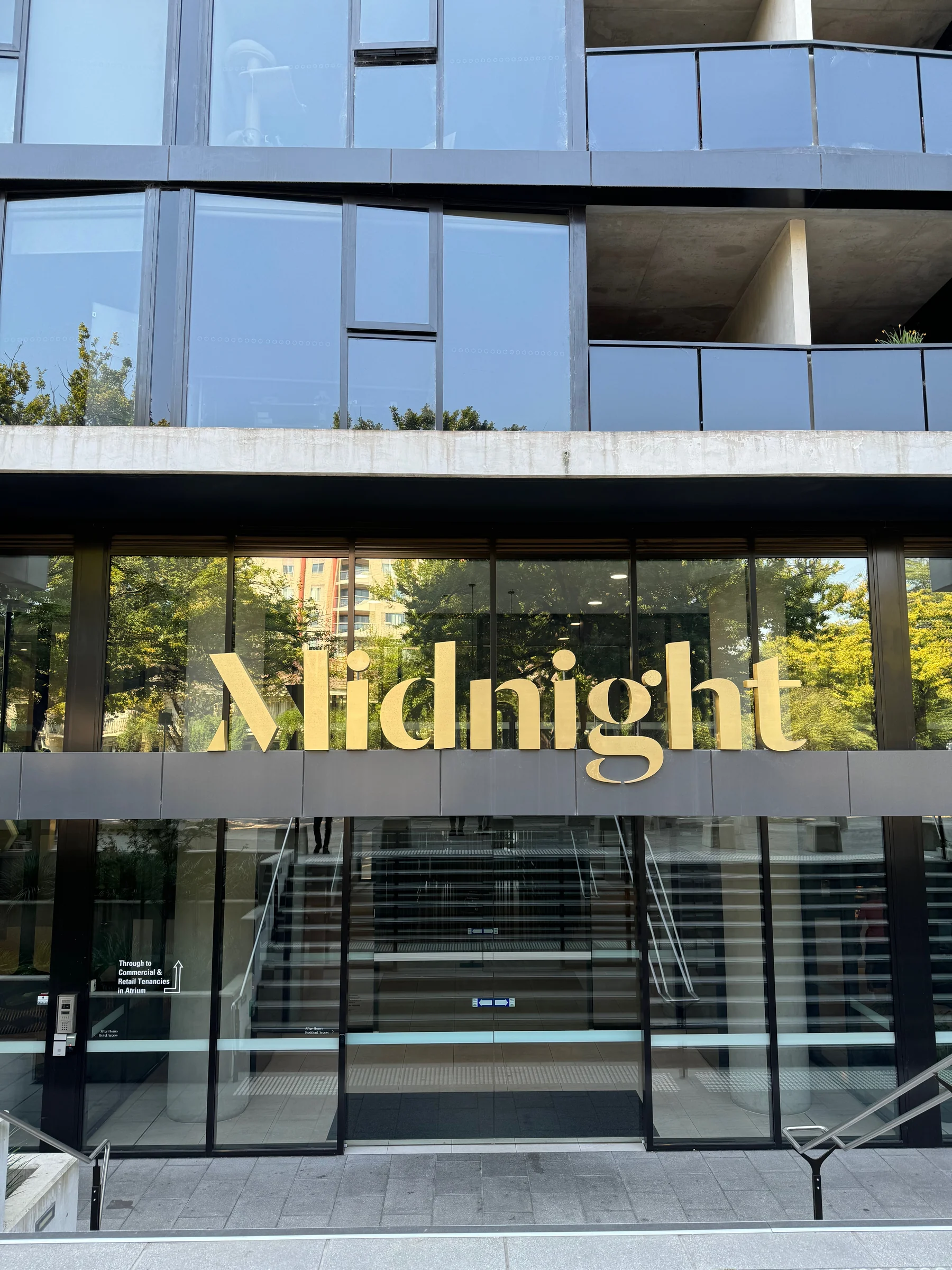 The illuminated Midnight sign at the entrance.