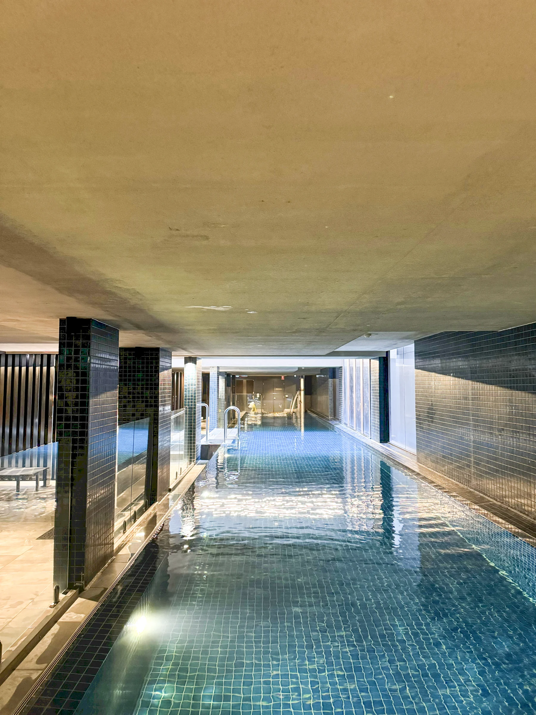 The quiet indoor pool stretching into the distance.
