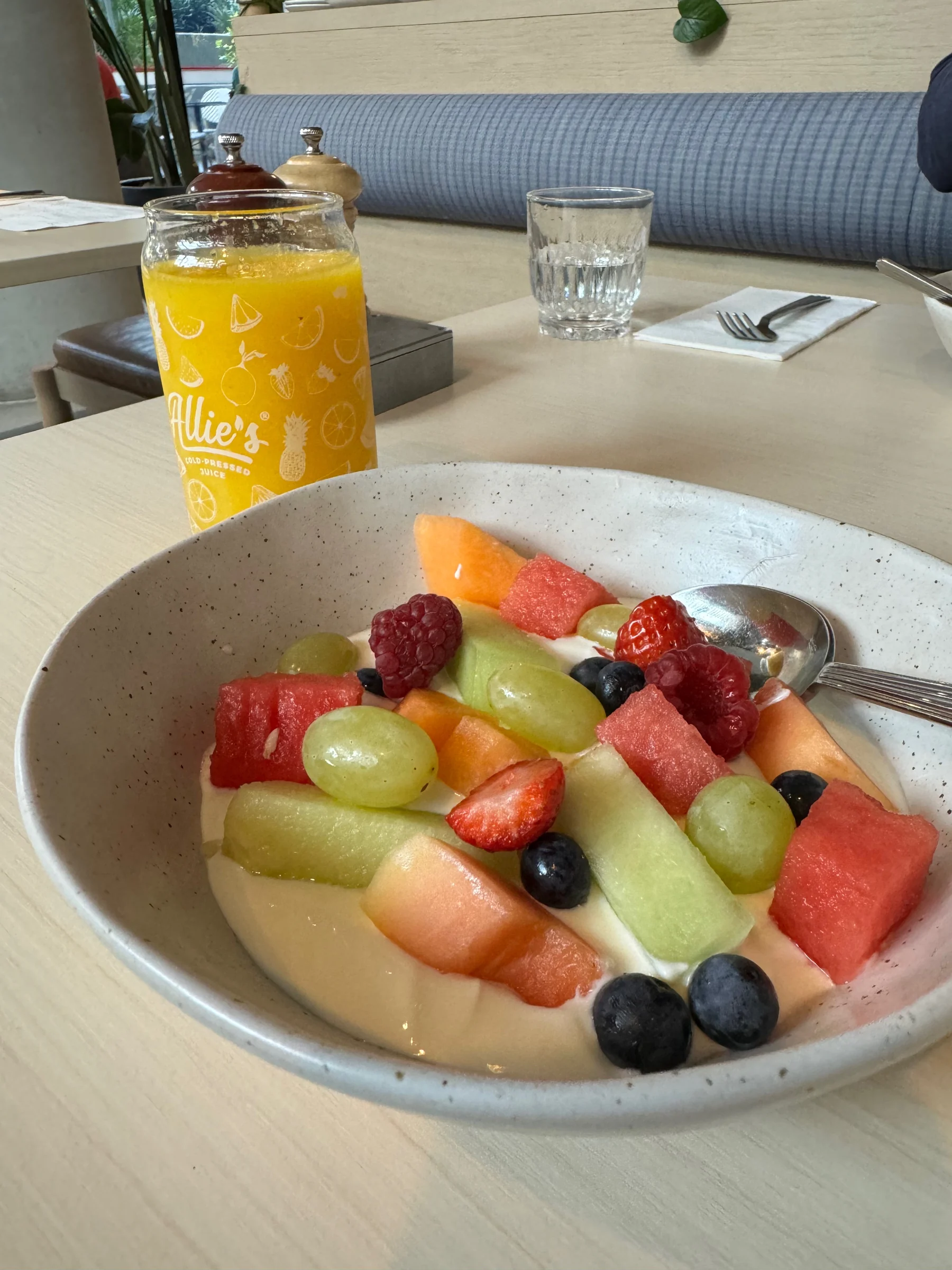 Starting the morning with fruit and juice.