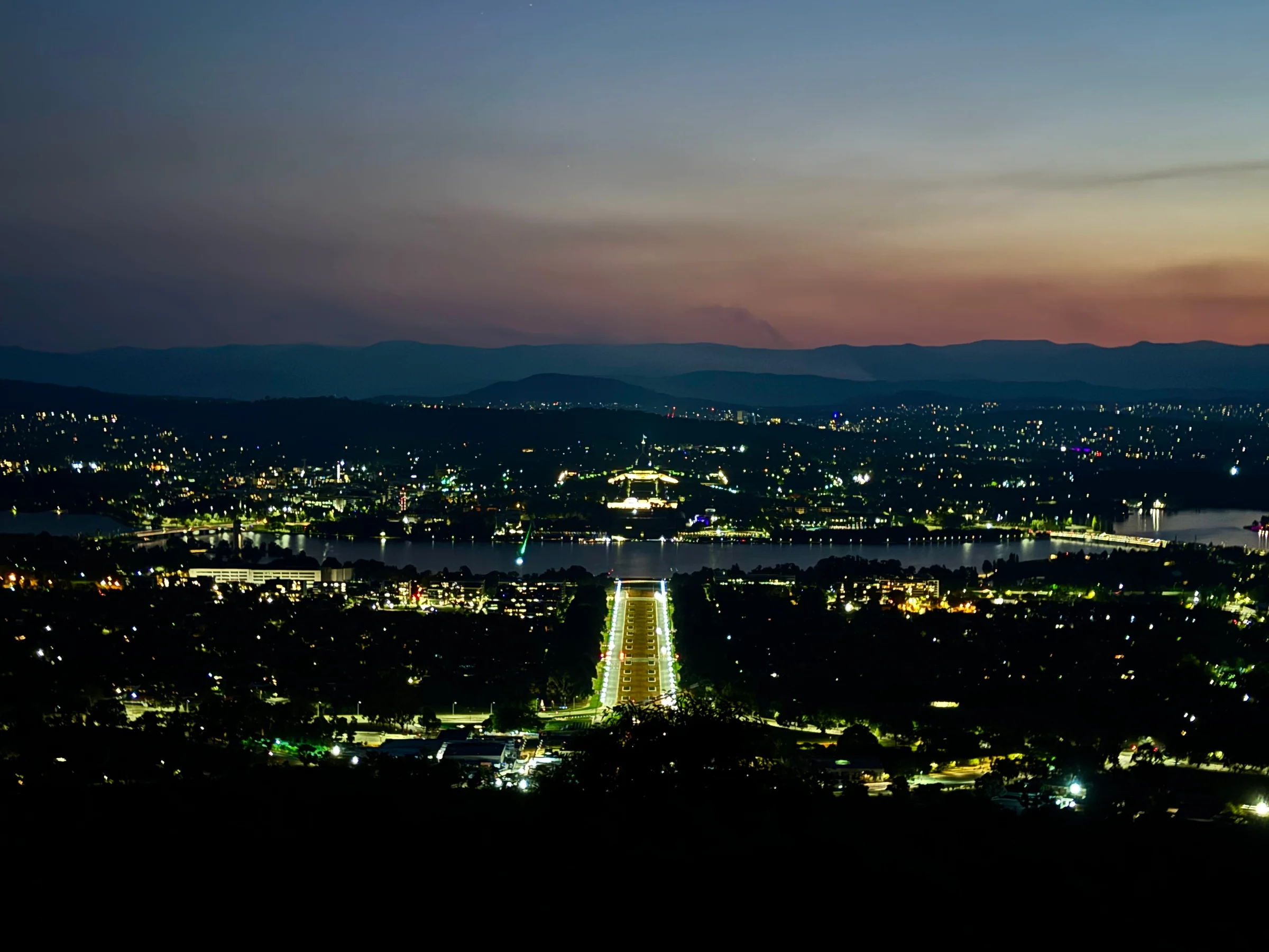 As the city lights come on.