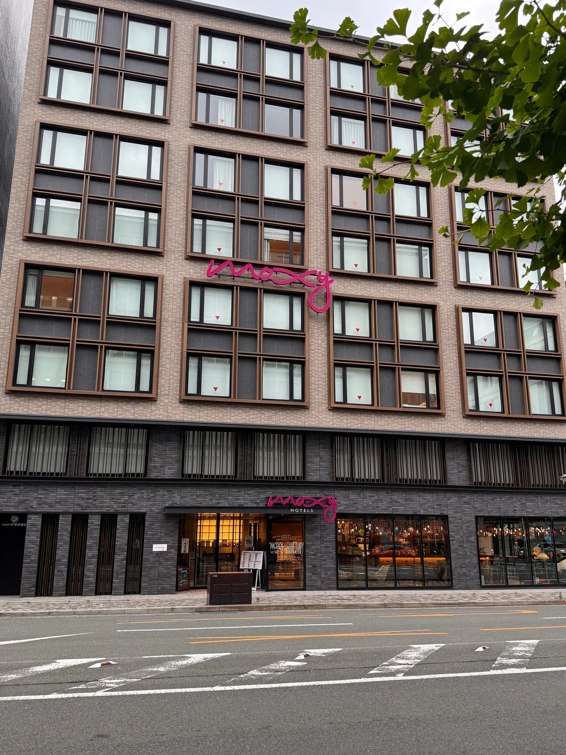 The Moxy exterior fitting into the Kyoto streetscape