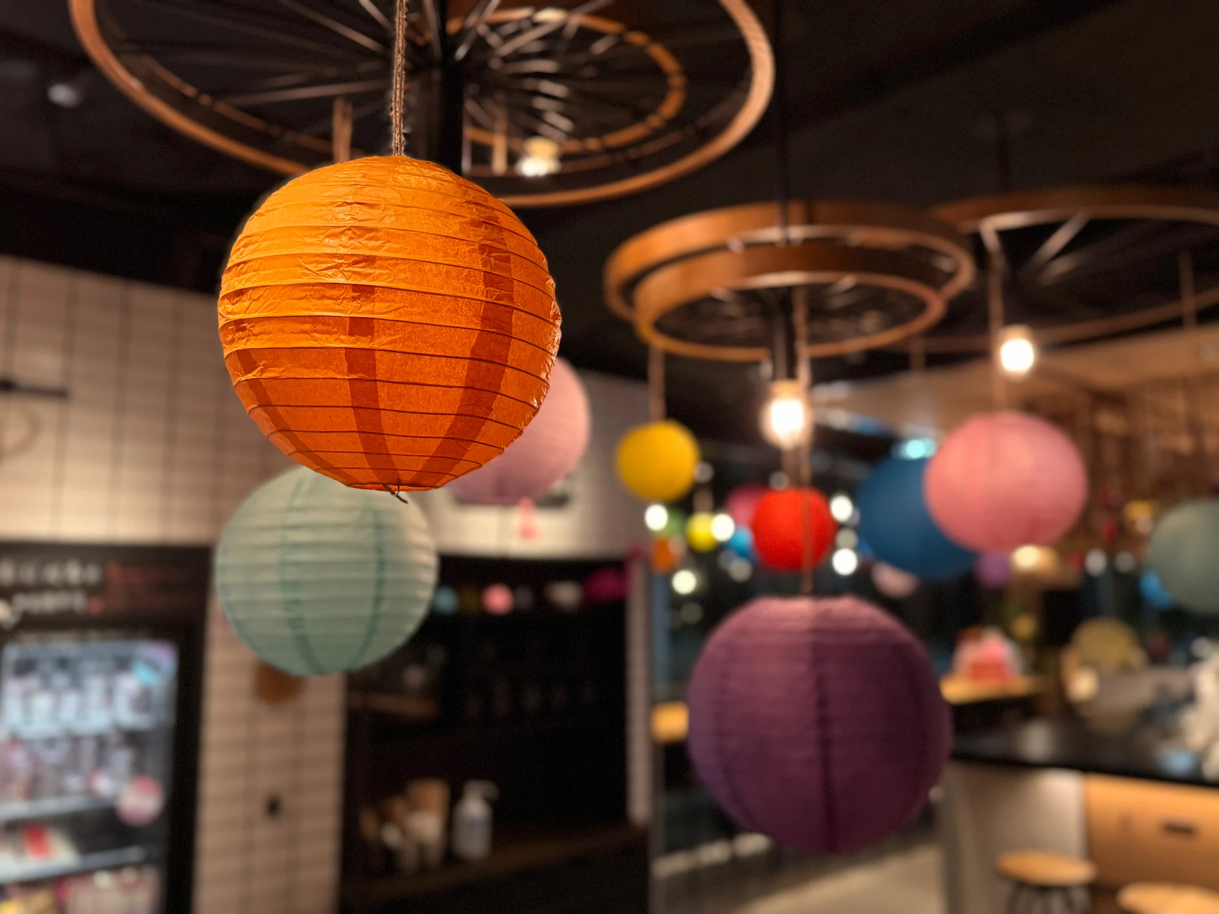 Colorful lanterns hanging over the bar