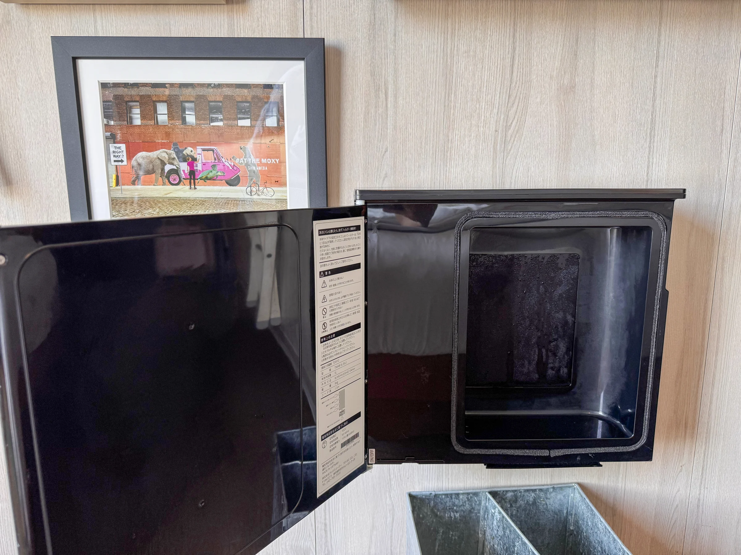 Even the little refrigerator was wall-mounted