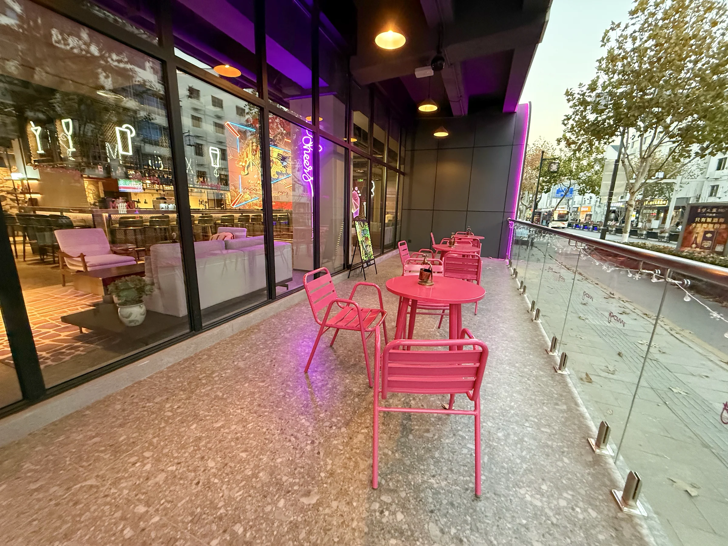 Pink tables on the terrace.