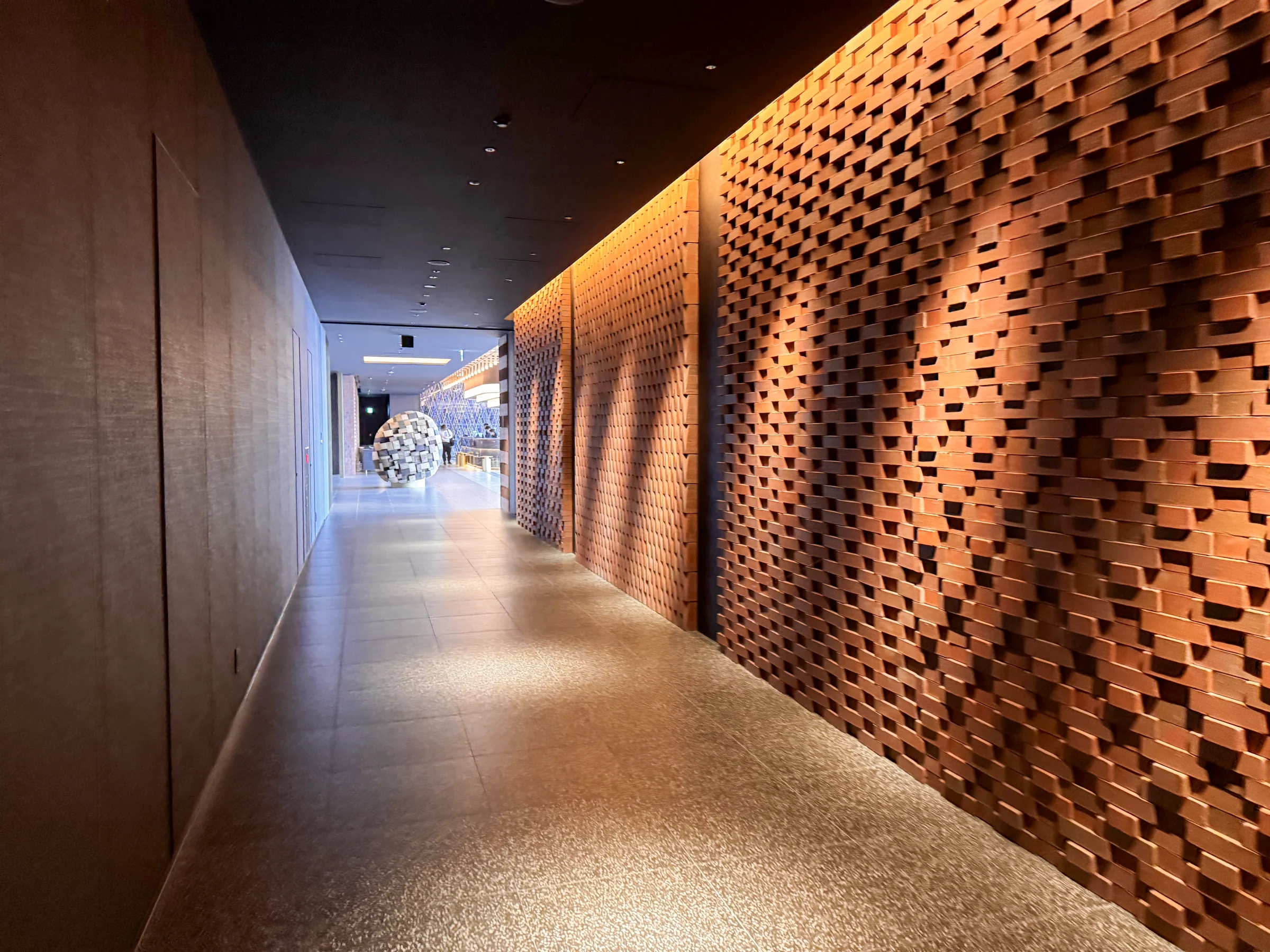 Brick walls along the 29th-floor passage