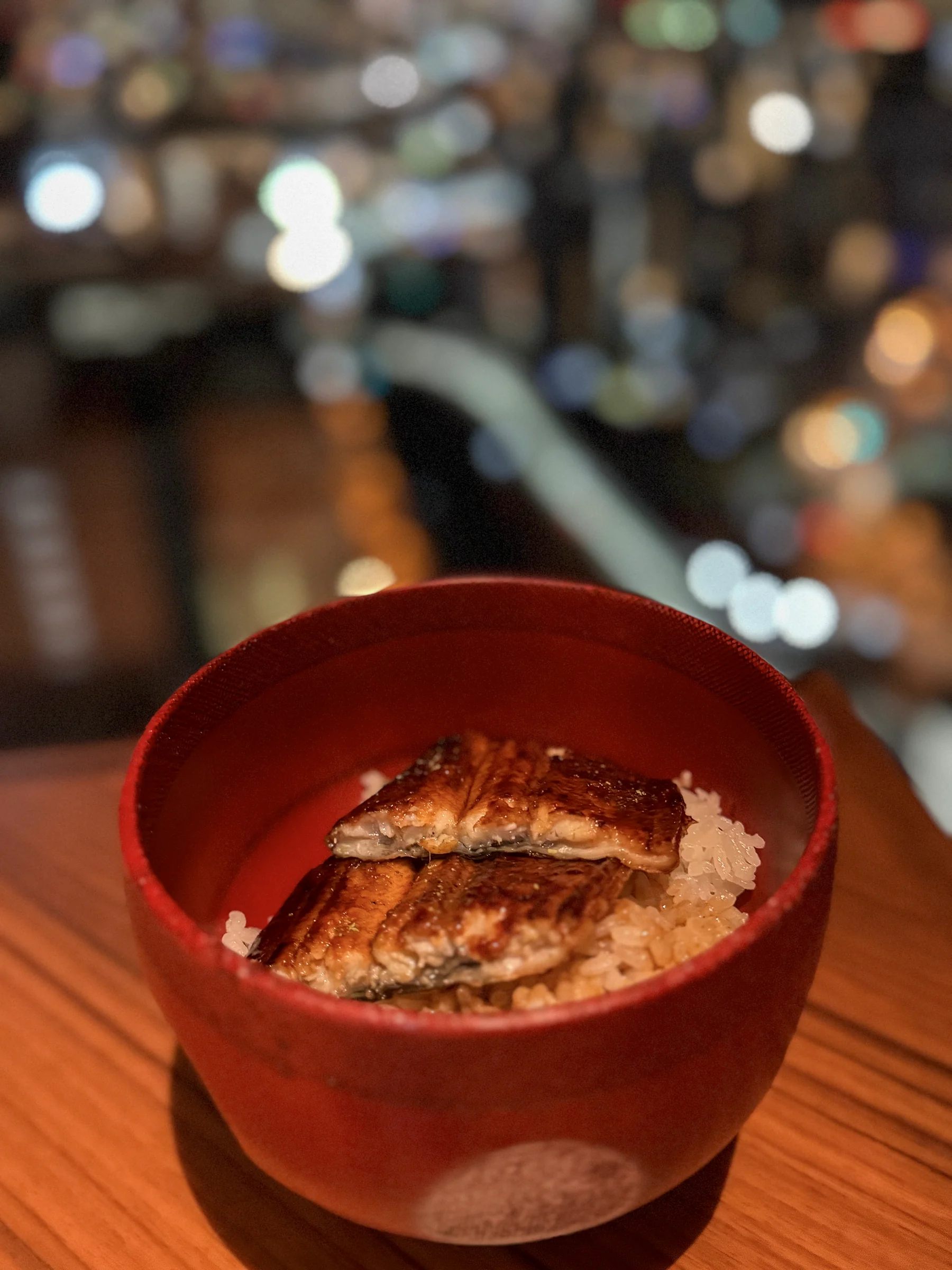 The eel rice bowl in a red dish, my dinner favourite