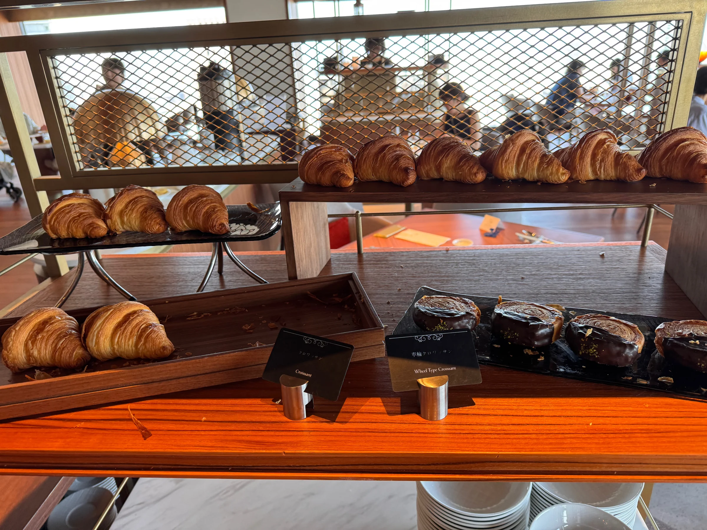 Shelves of croissants and bread