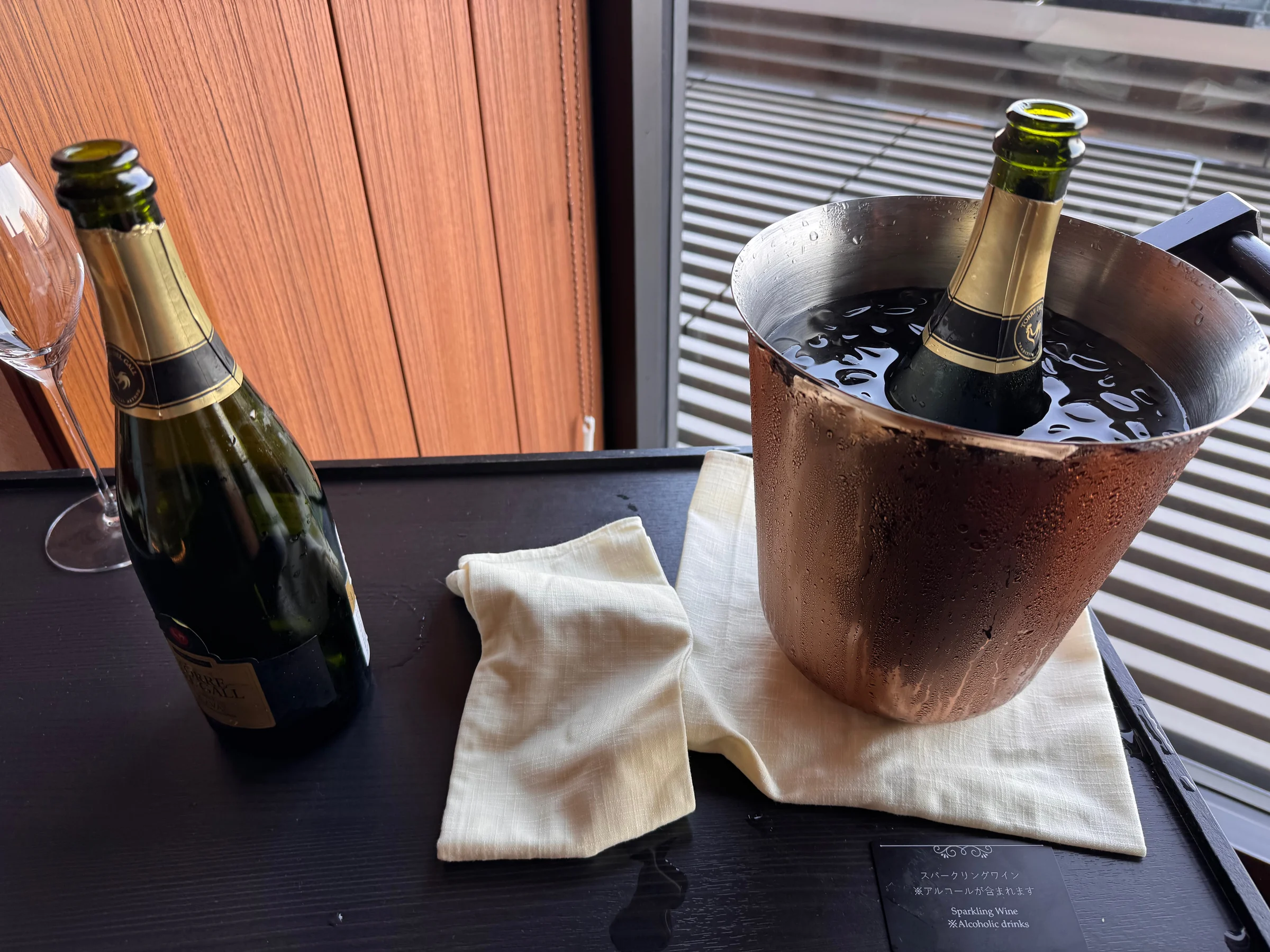 Champagne beside the window