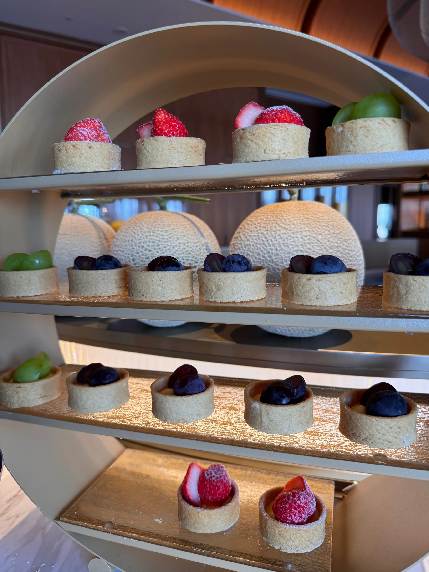 Tarts topped with juicy fruit