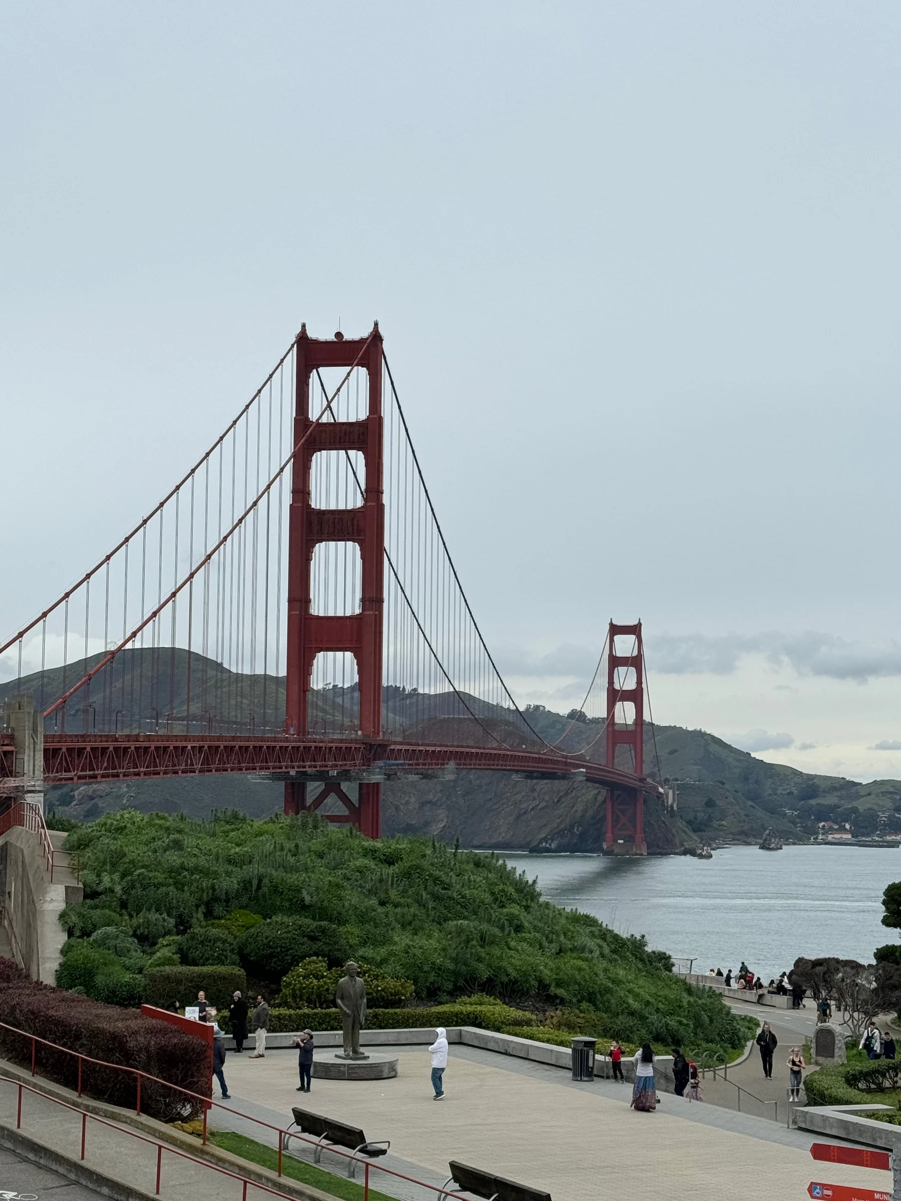 The Golden Gate Bridge under cloudy skies.
