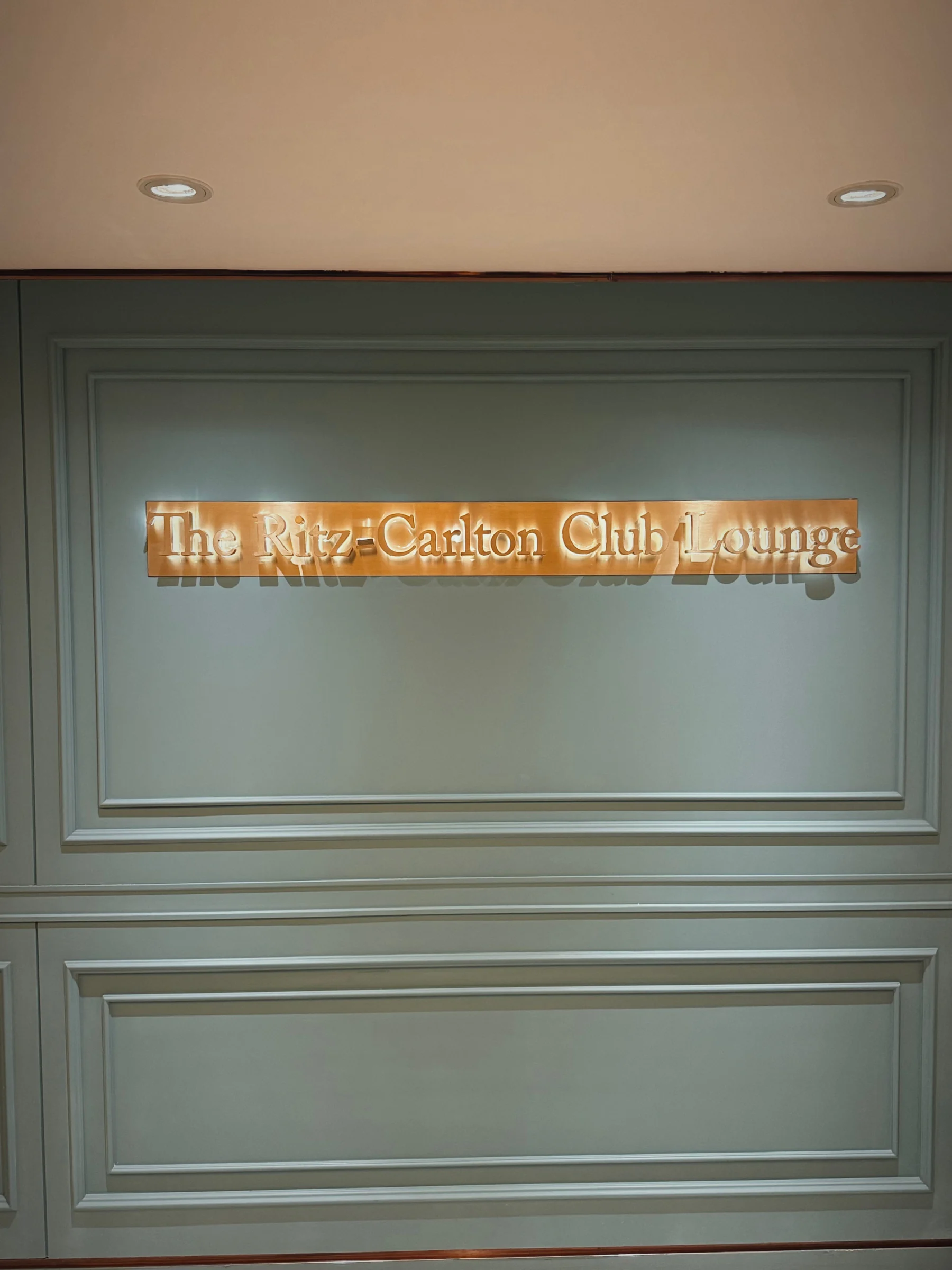 The Ritz-Carlton Club Lounge sign