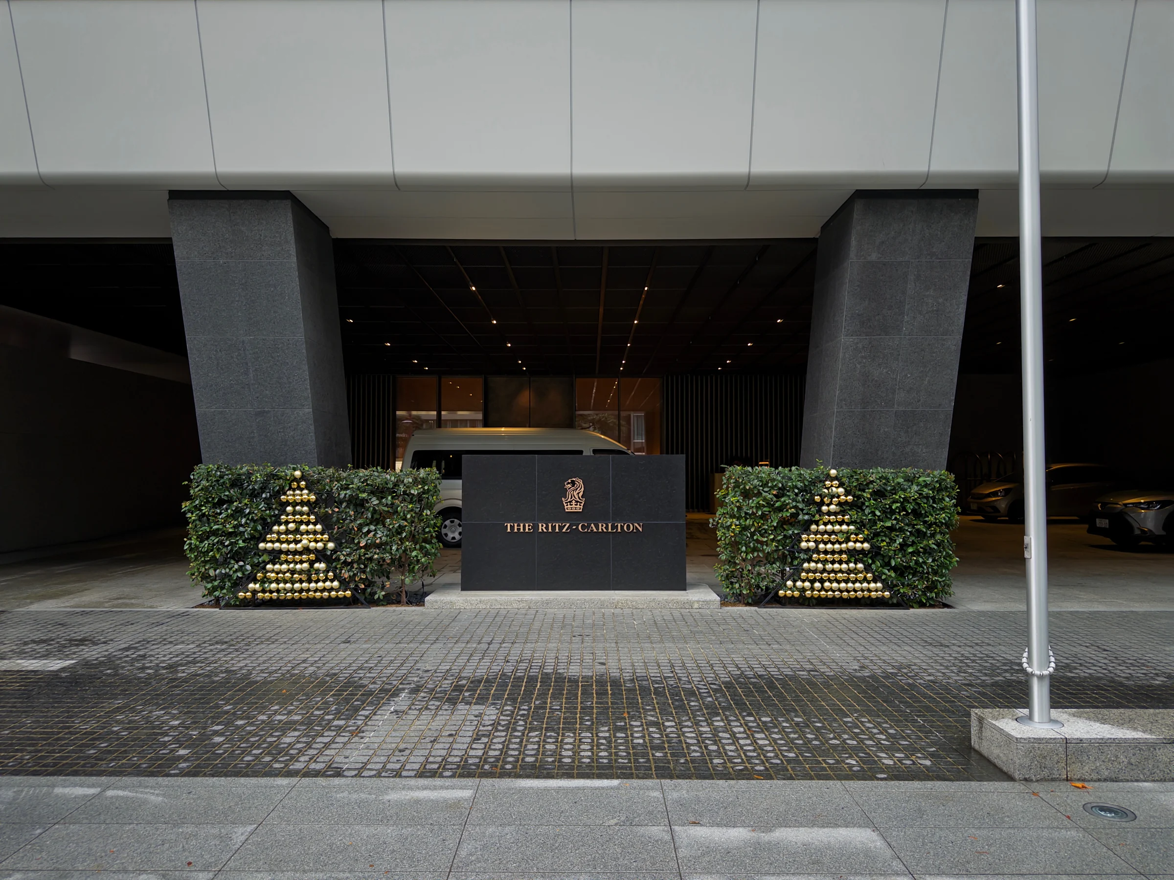 The entrance and sign at The Ritz-Carlton, Fukuoka