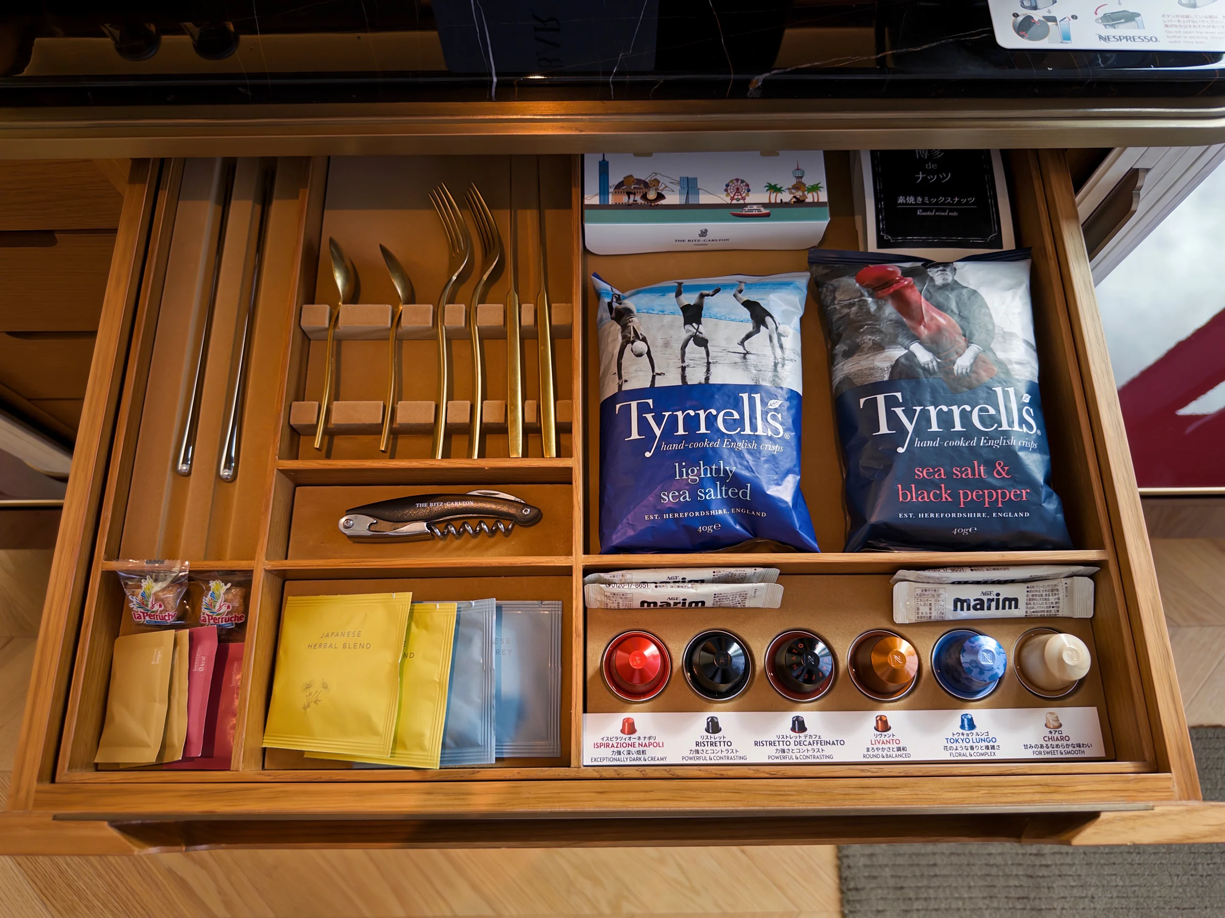 Coffee and tea arranged in a drawer