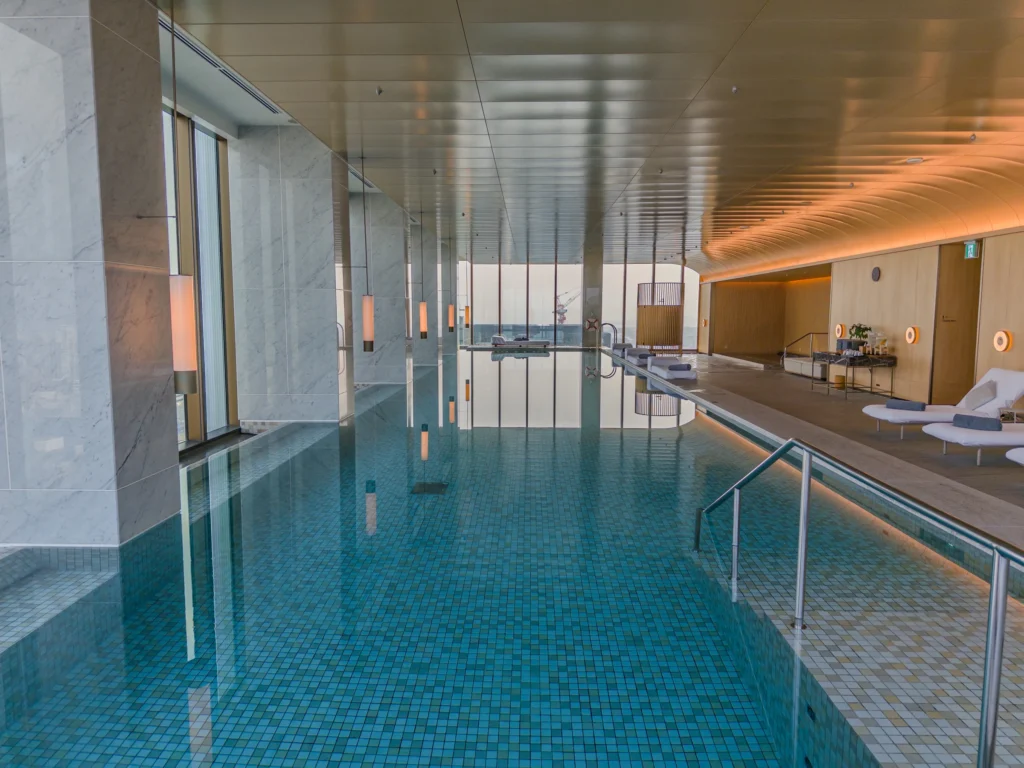 Large windows and morning light at the pool
