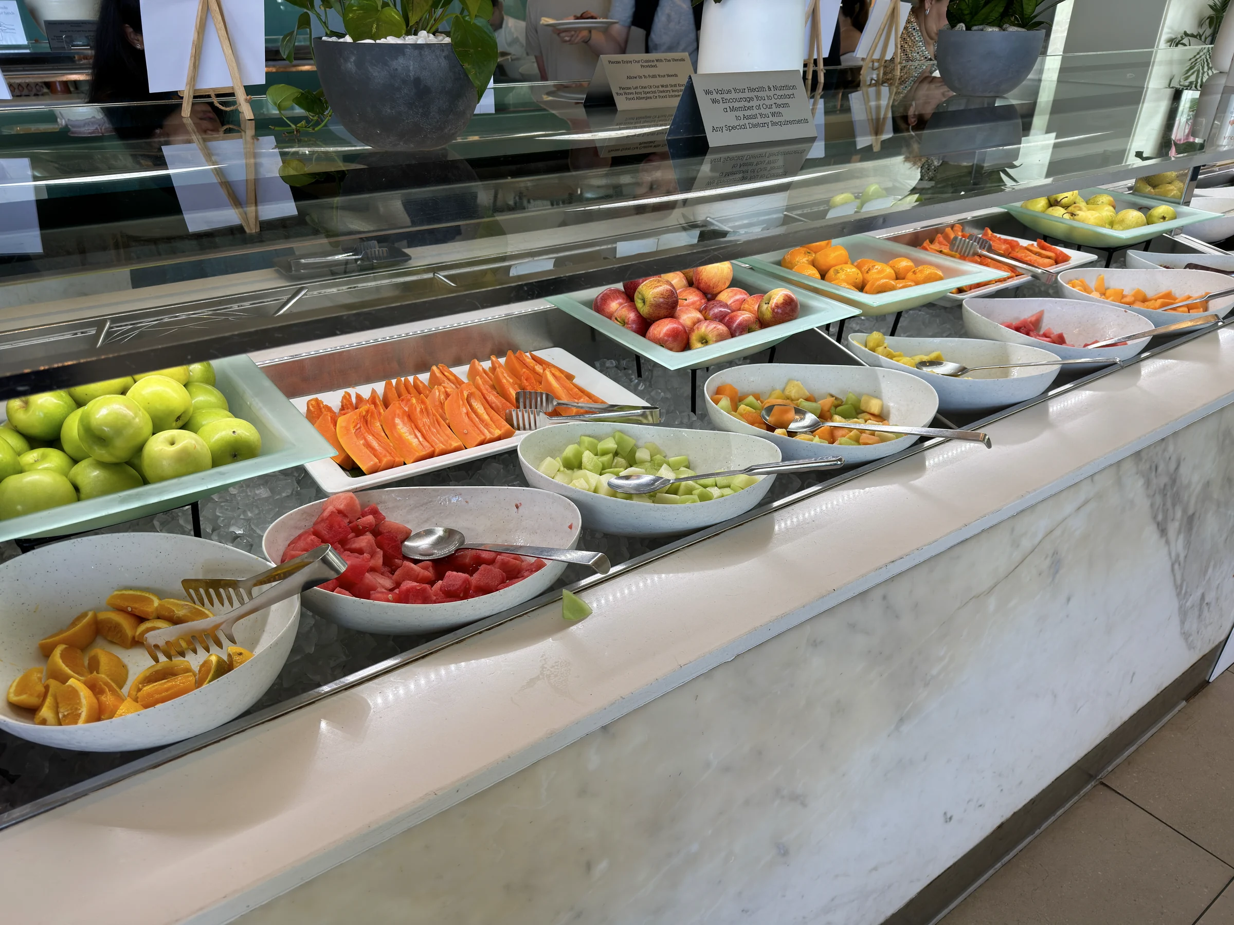 Fruit and salad at the buffet.
