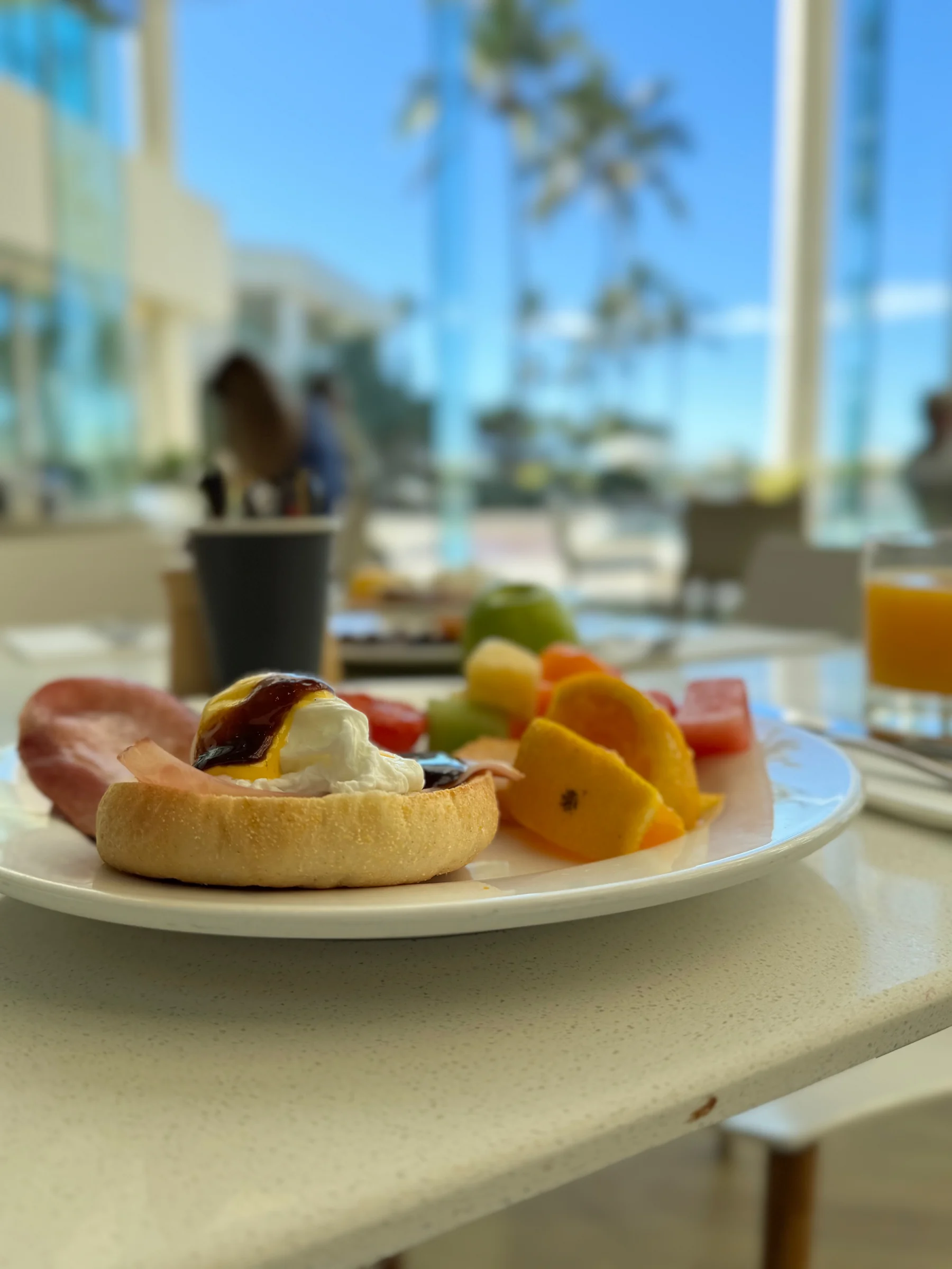 Breakfast with palm-tree views.