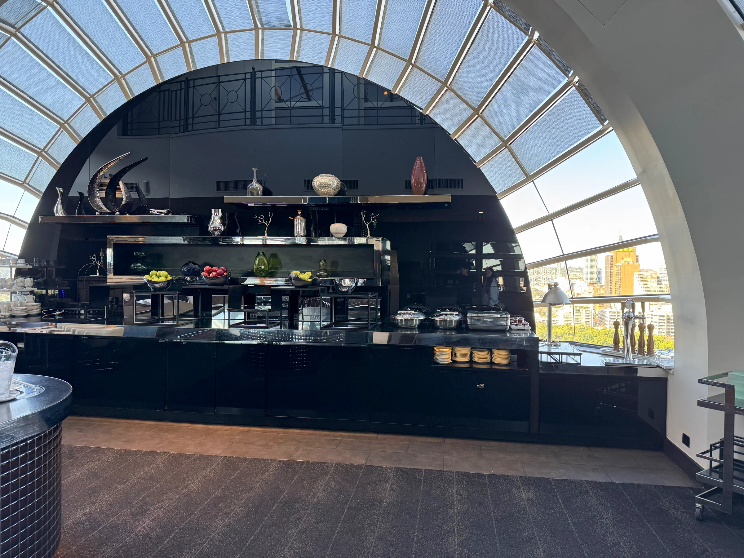 Arched windows and the club lounge bar counter.