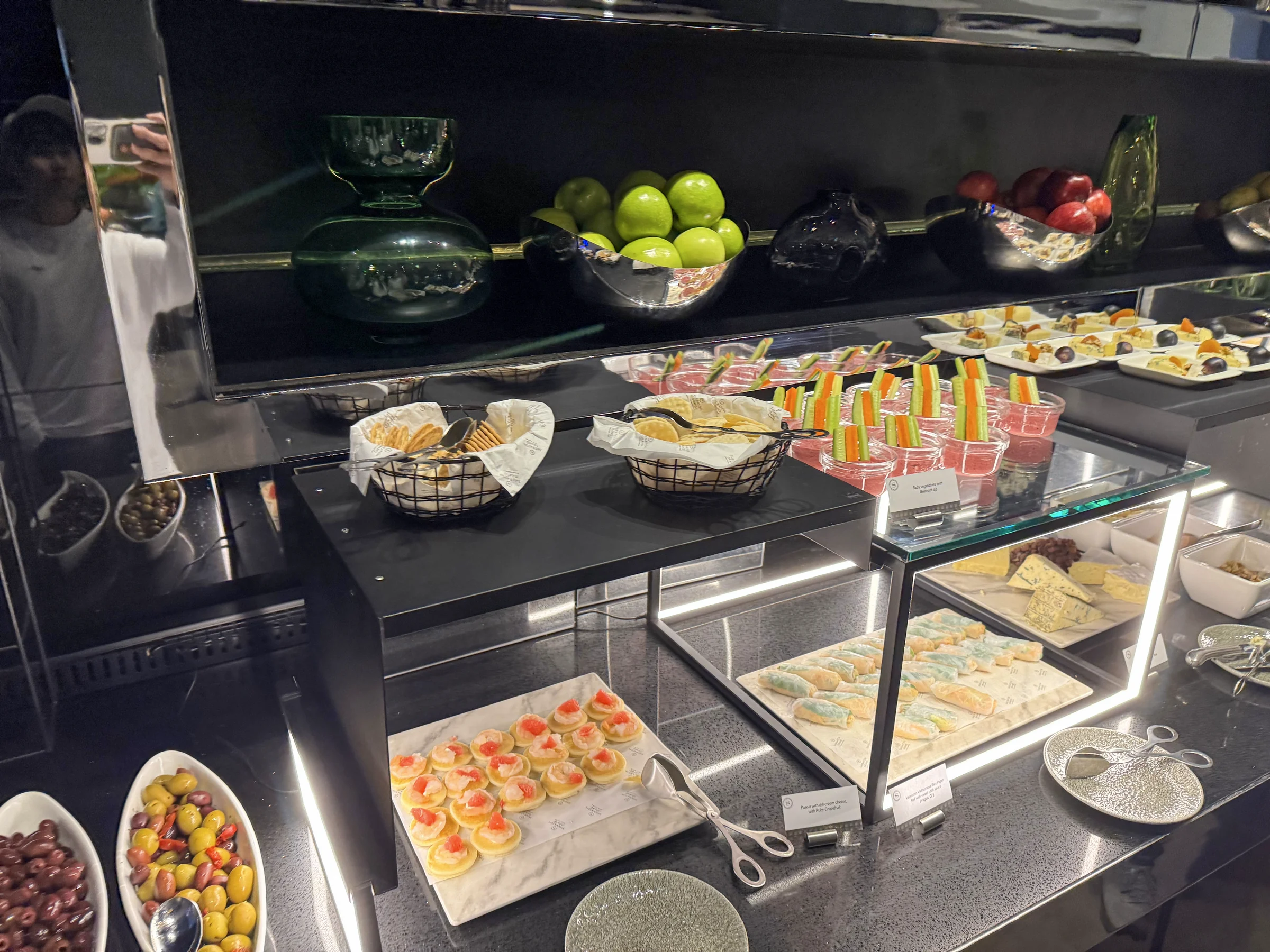 Cheese and cold dishes on the lounge counter.