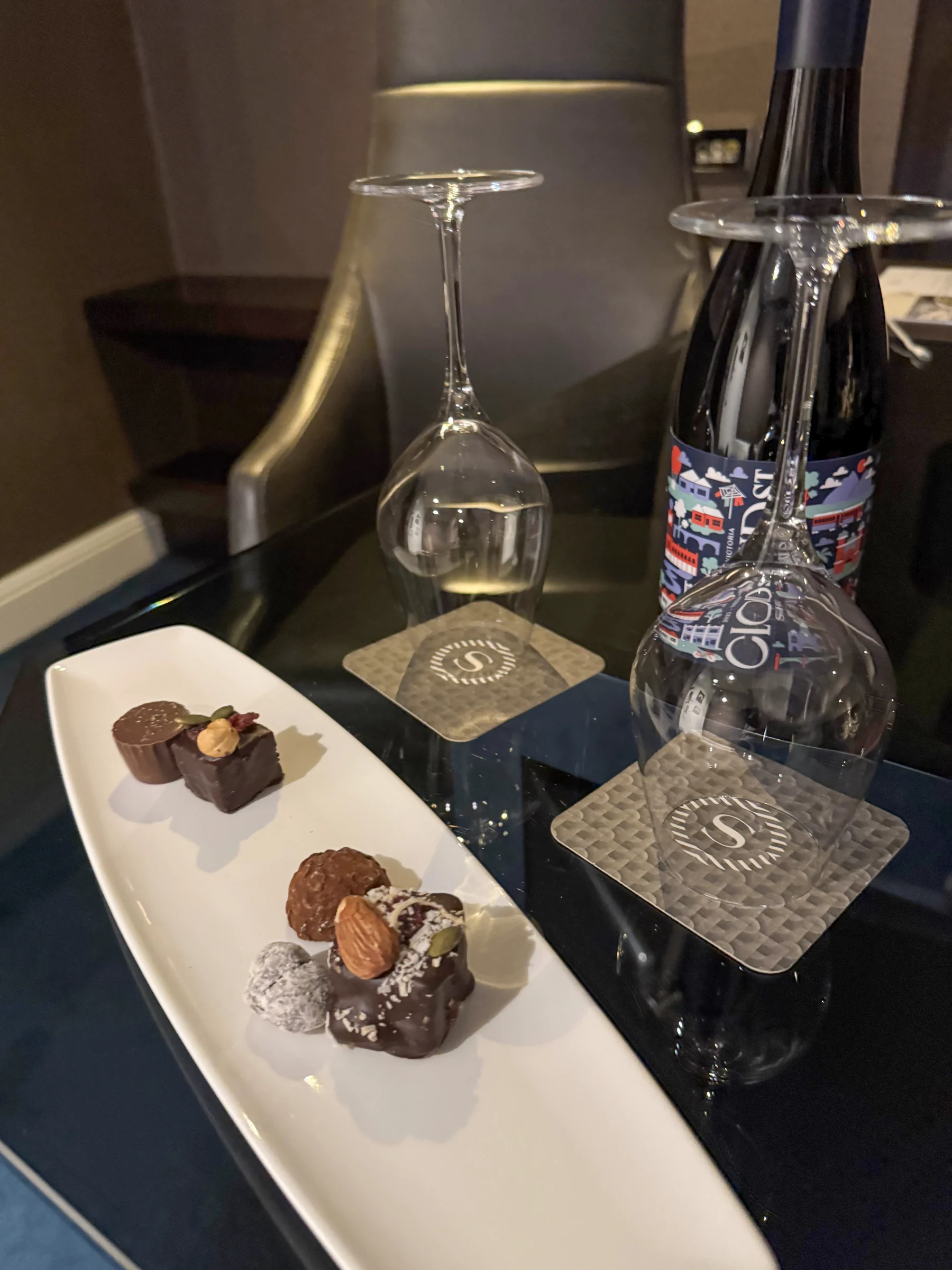 Red wine and welcome sweets delivered to the room.