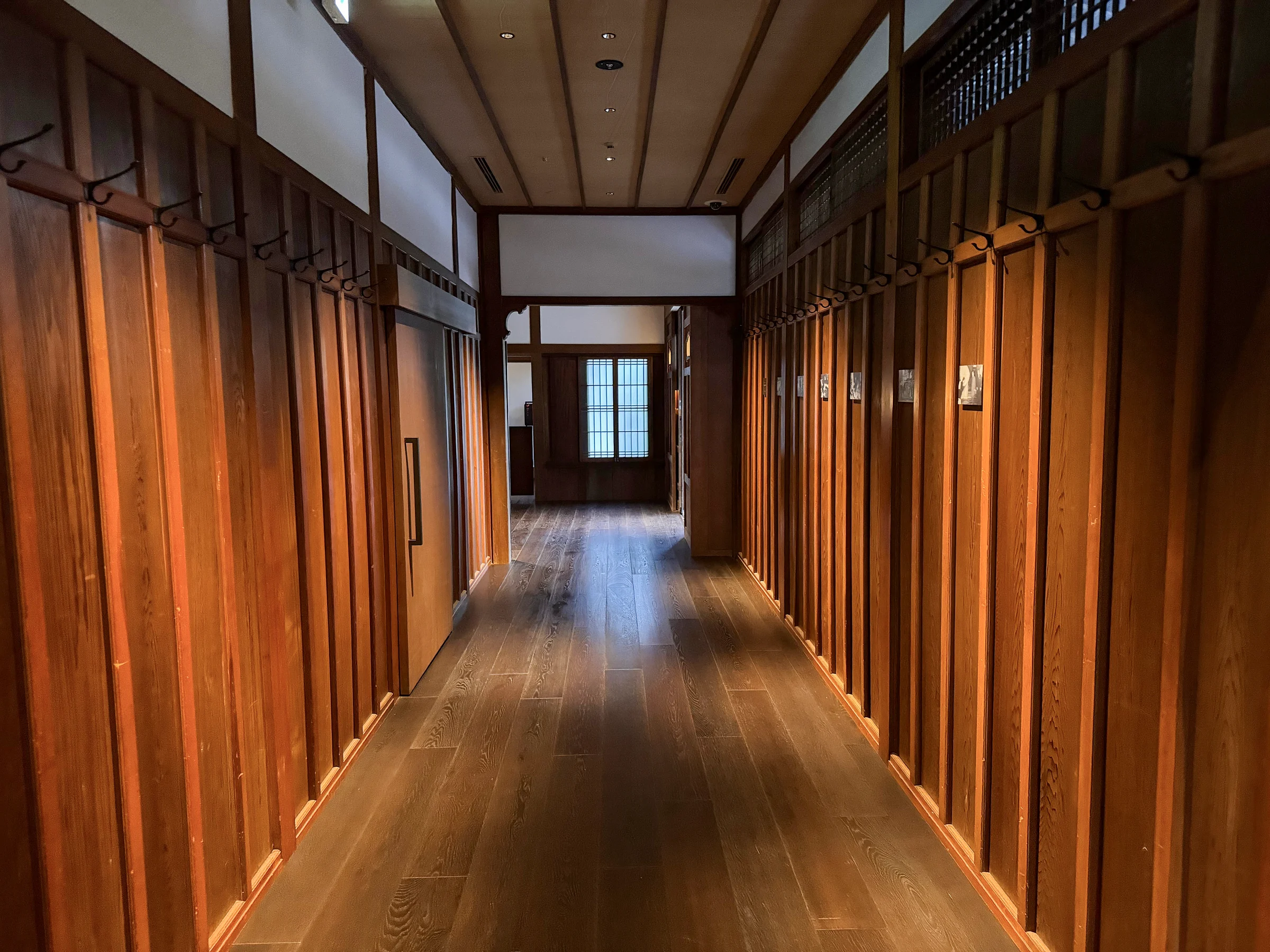 Through a wooden corridor to the garden.