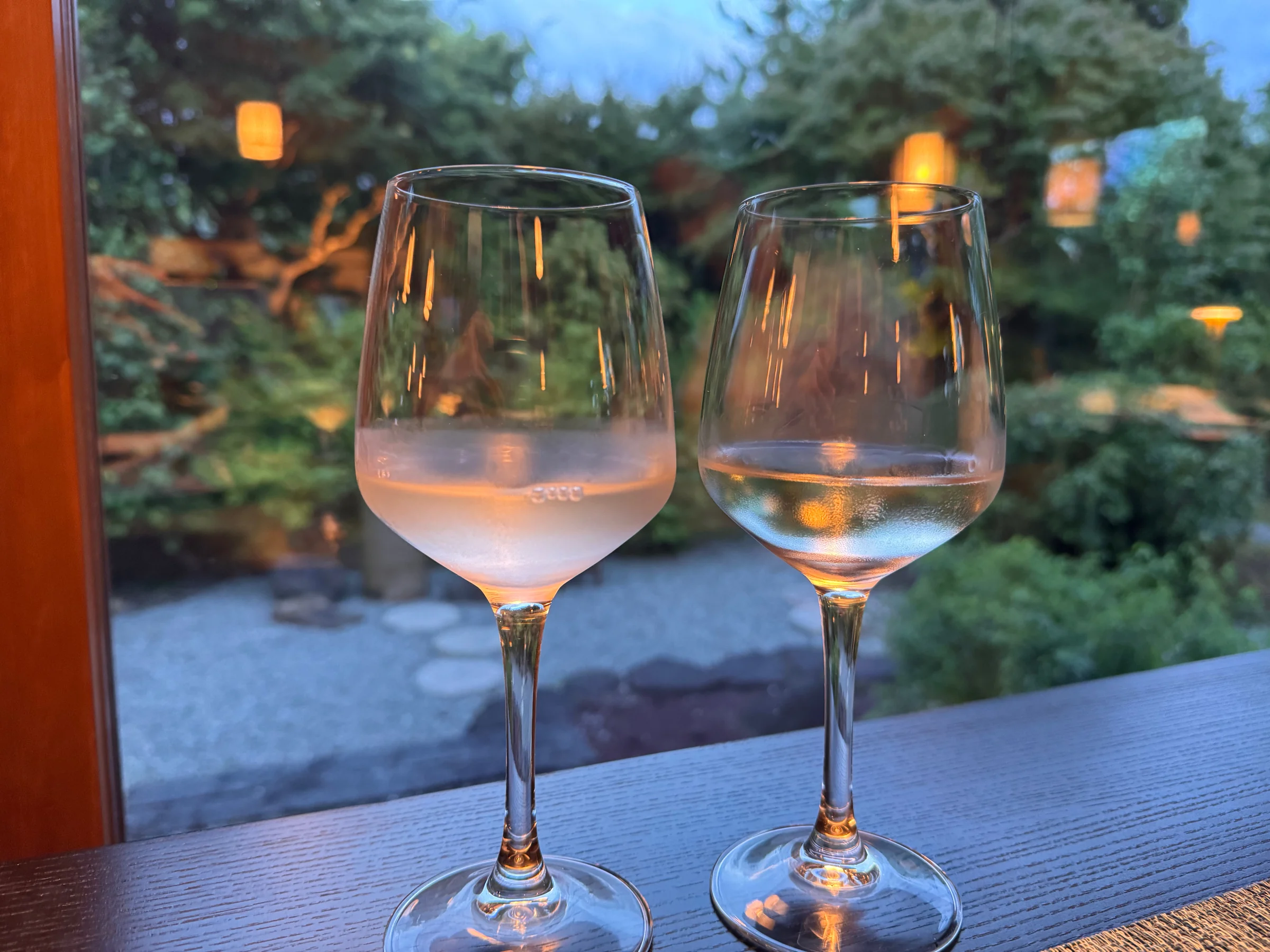 A toast with Nara's Mimuro Sugi sake, overlooking the garden.