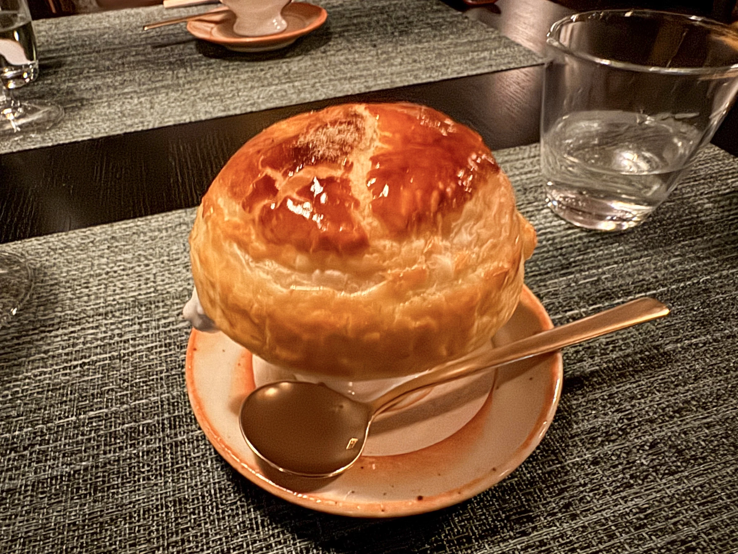 A golden pastry-wrapped dish.