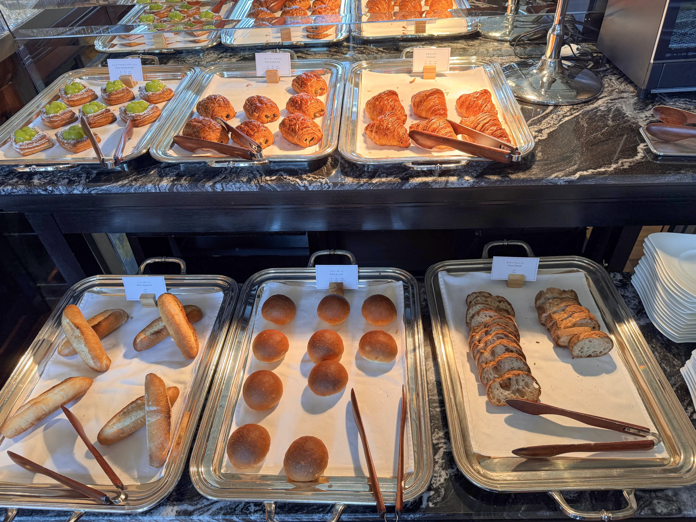 Bread and pastries on the buffet.