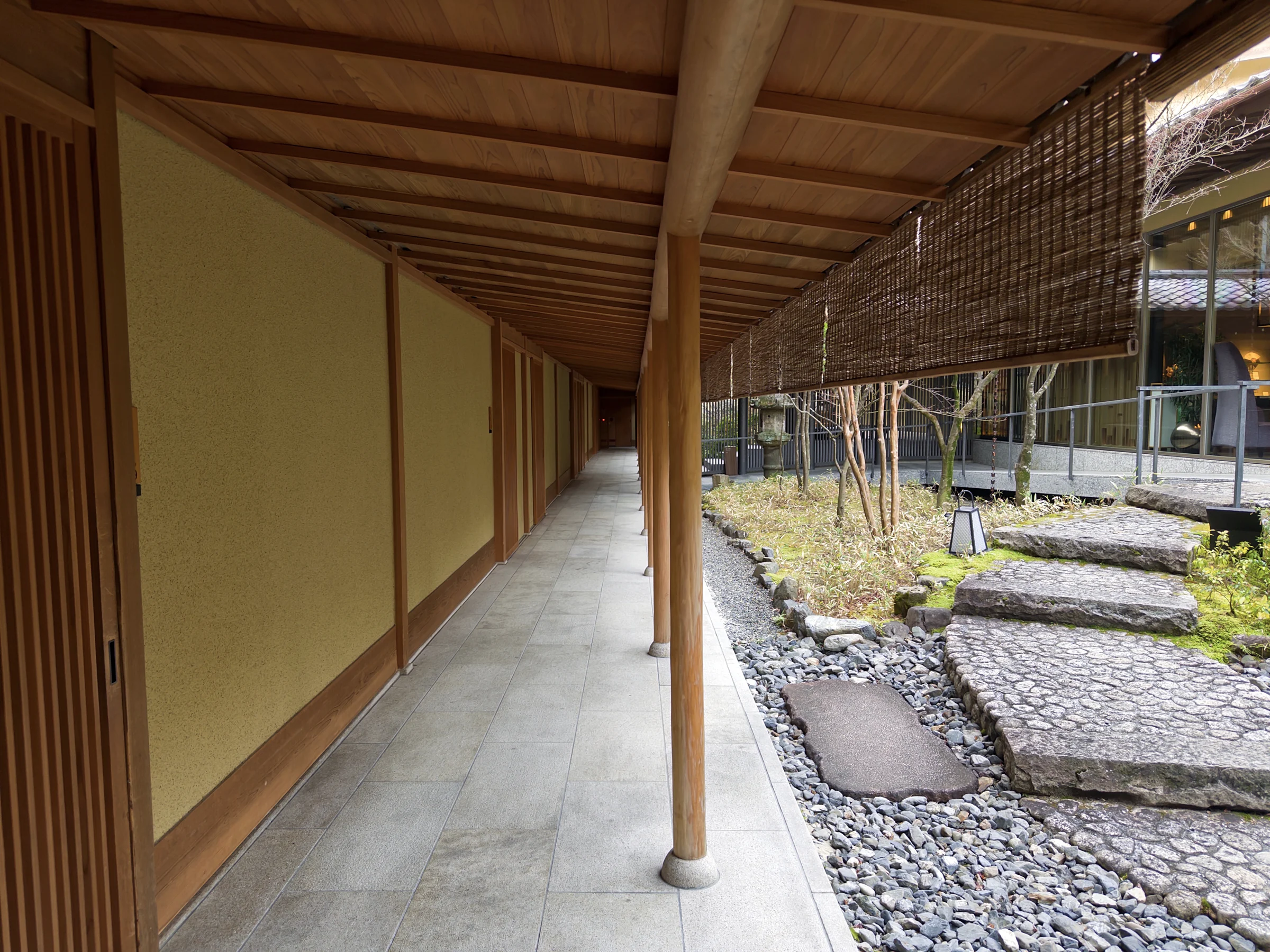 A covered walkway along the garden